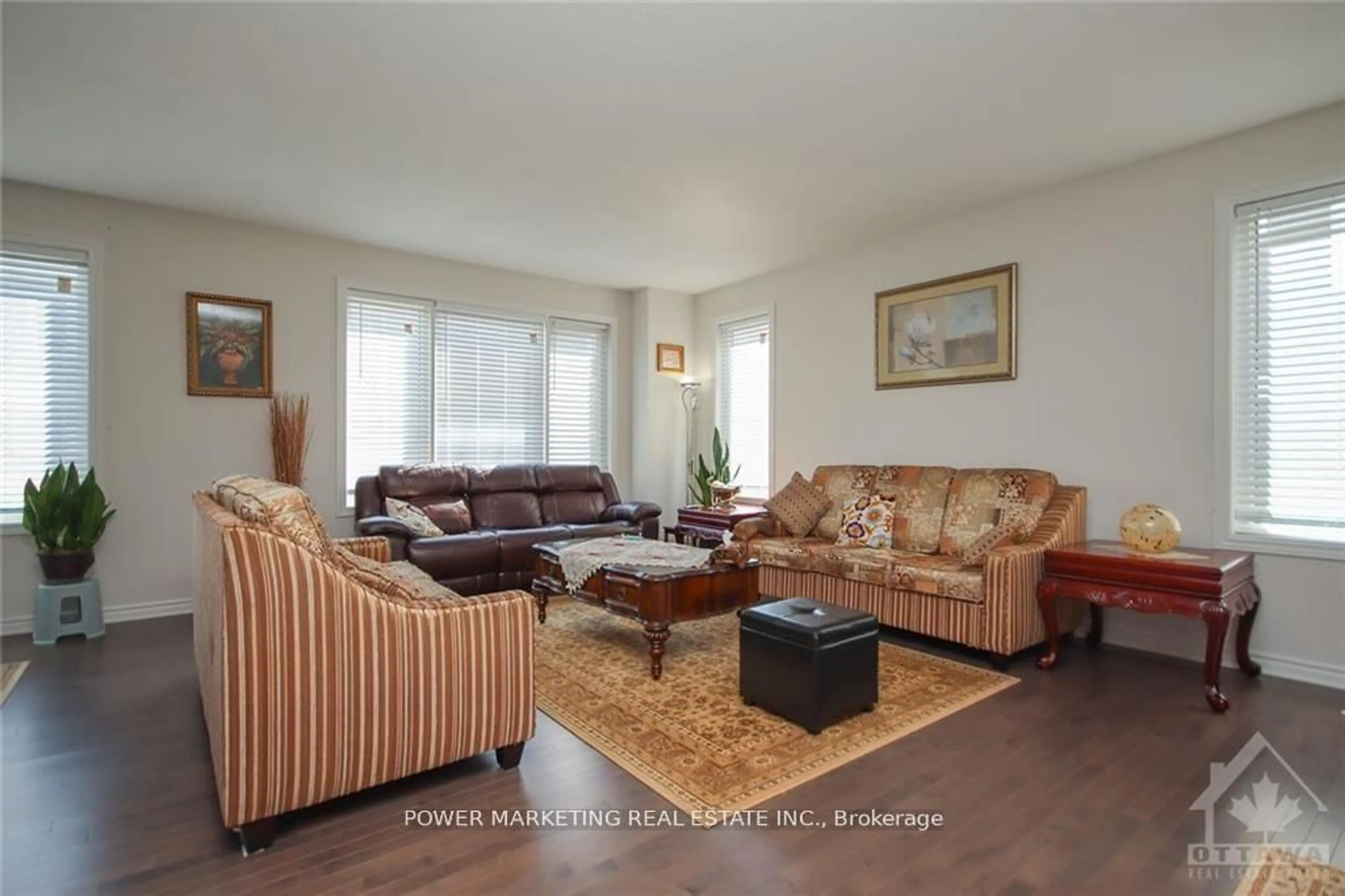 Living room with furniture, wood/laminate floor for 339 LAMARCHE Ave, Ottawa Ontario K1W 0M9