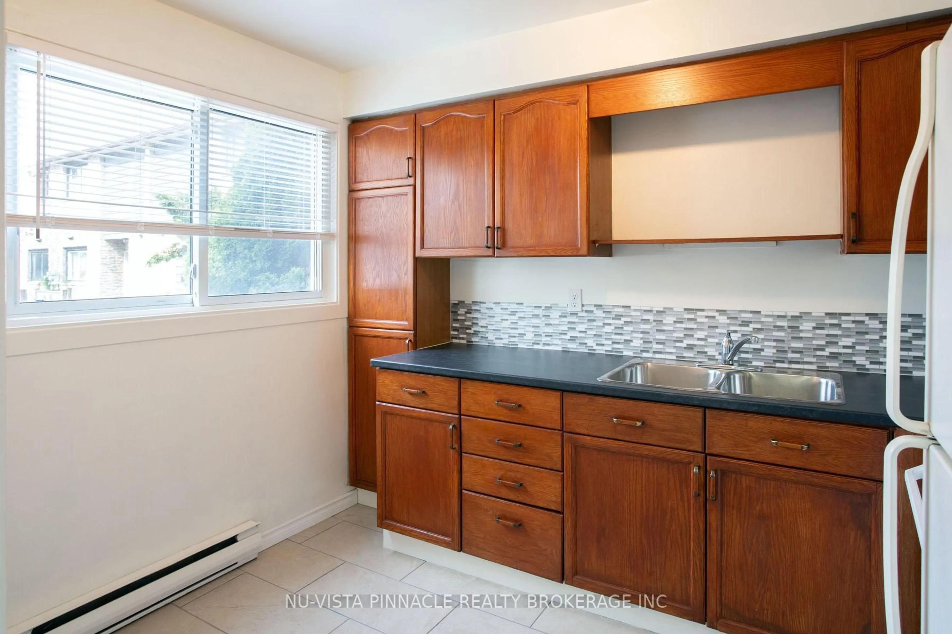 Standard kitchen, ceramic/tile floor for 40 Summit Ave #126, London North Ontario N6H 4S3