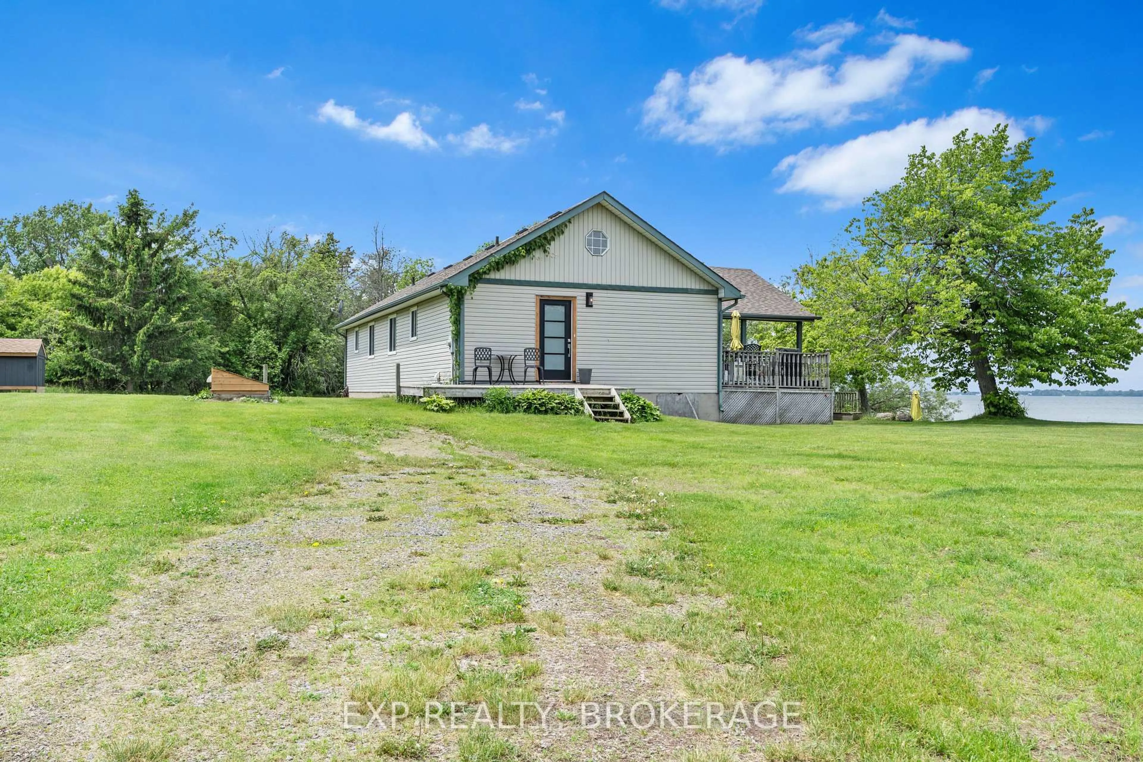 A pic from outside/outdoor area/front of a property/back of a property/a pic from drone, unknown for 168B GOLD COAST Lane, Wolfe Island Ontario K0H 2Y0