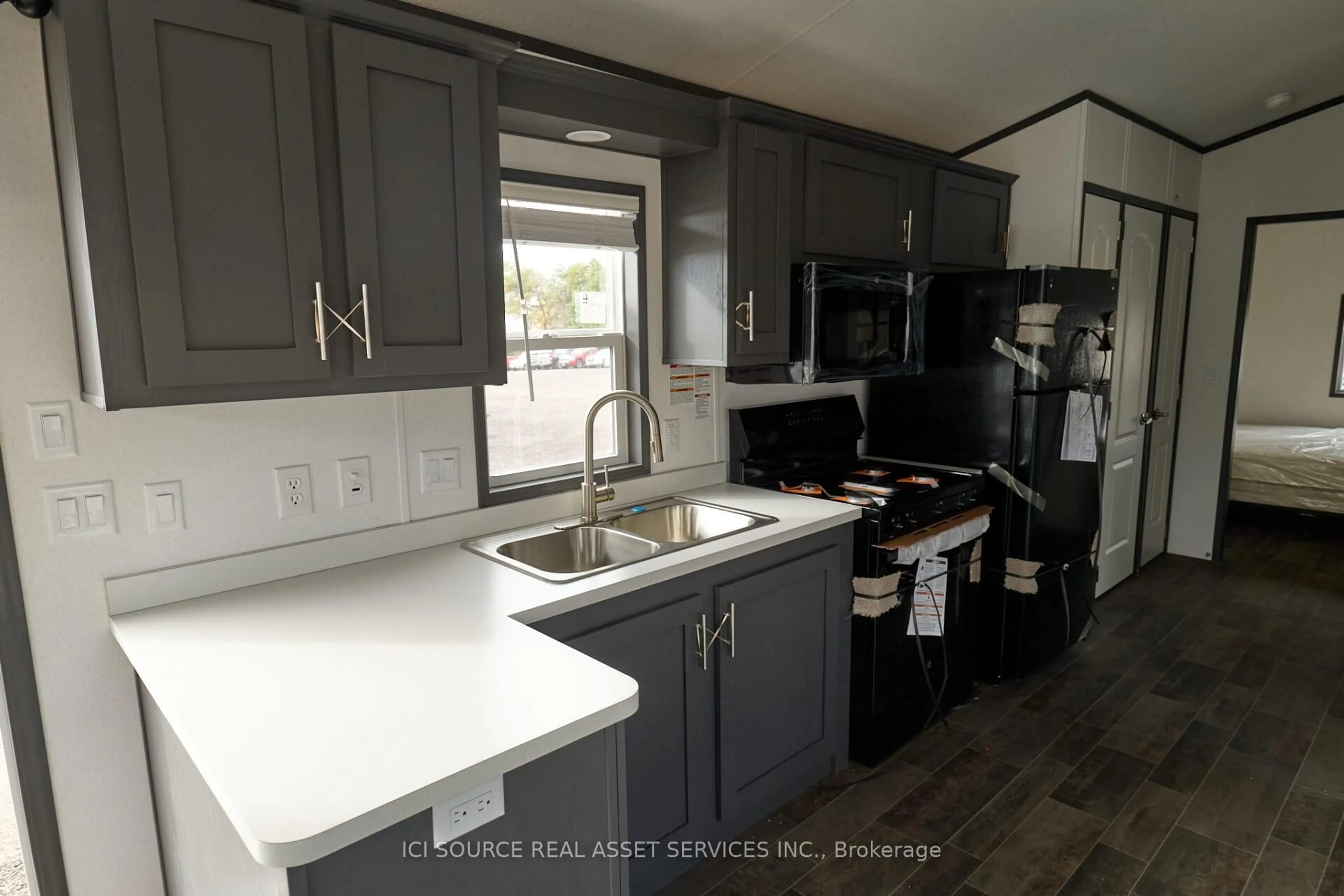 Open concept kitchen, ceramic/tile floor for 1336 S Morrison Lake Rd #JUNIPR, Gravenhurst Ontario P0E 1G0