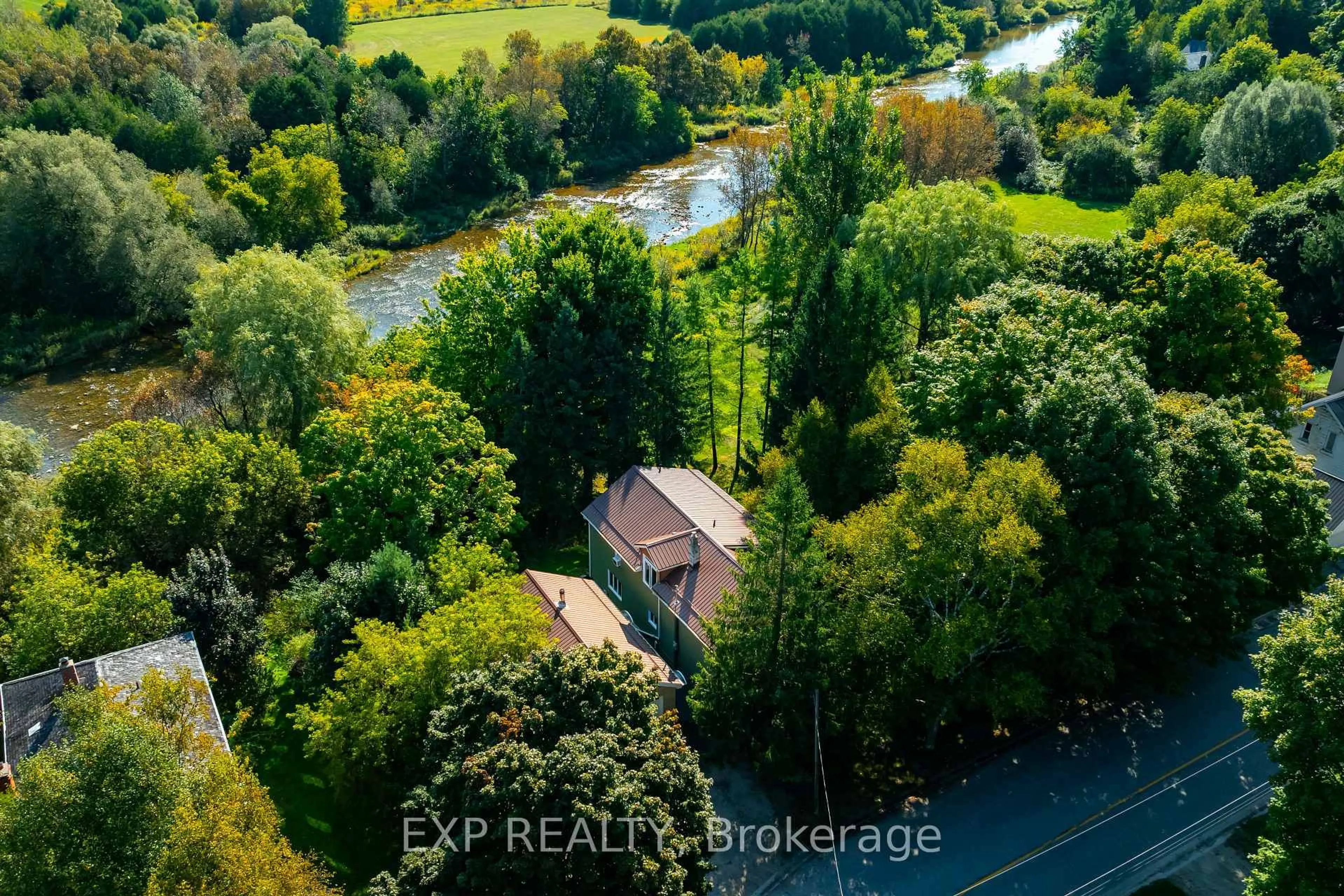 A pic from outside/outdoor area/front of a property/back of a property/a pic from drone, water/lake/river/ocean view for 16 Mill St, Amaranth Ontario L9W 3Z3