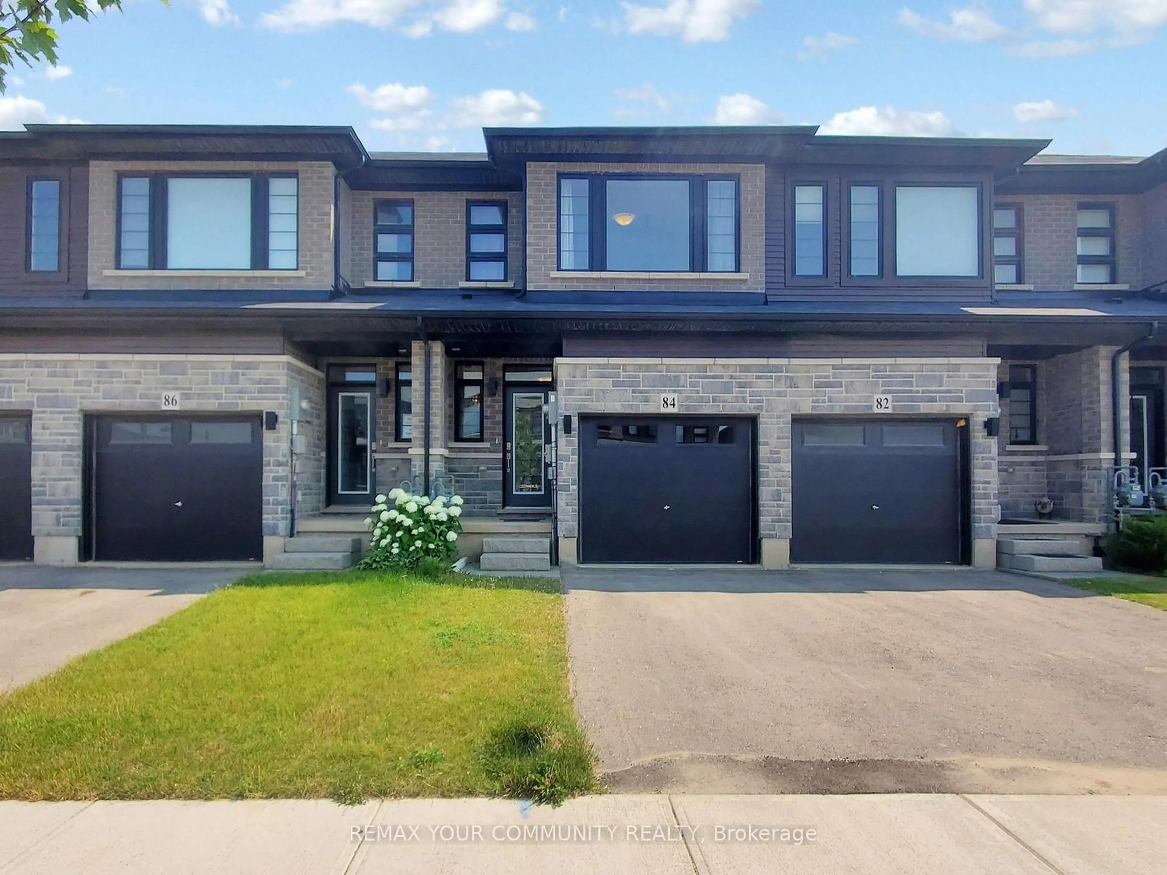 Home with brick exterior material, street for 84 June Callwood Way, Brantford Ontario N3T 0T2