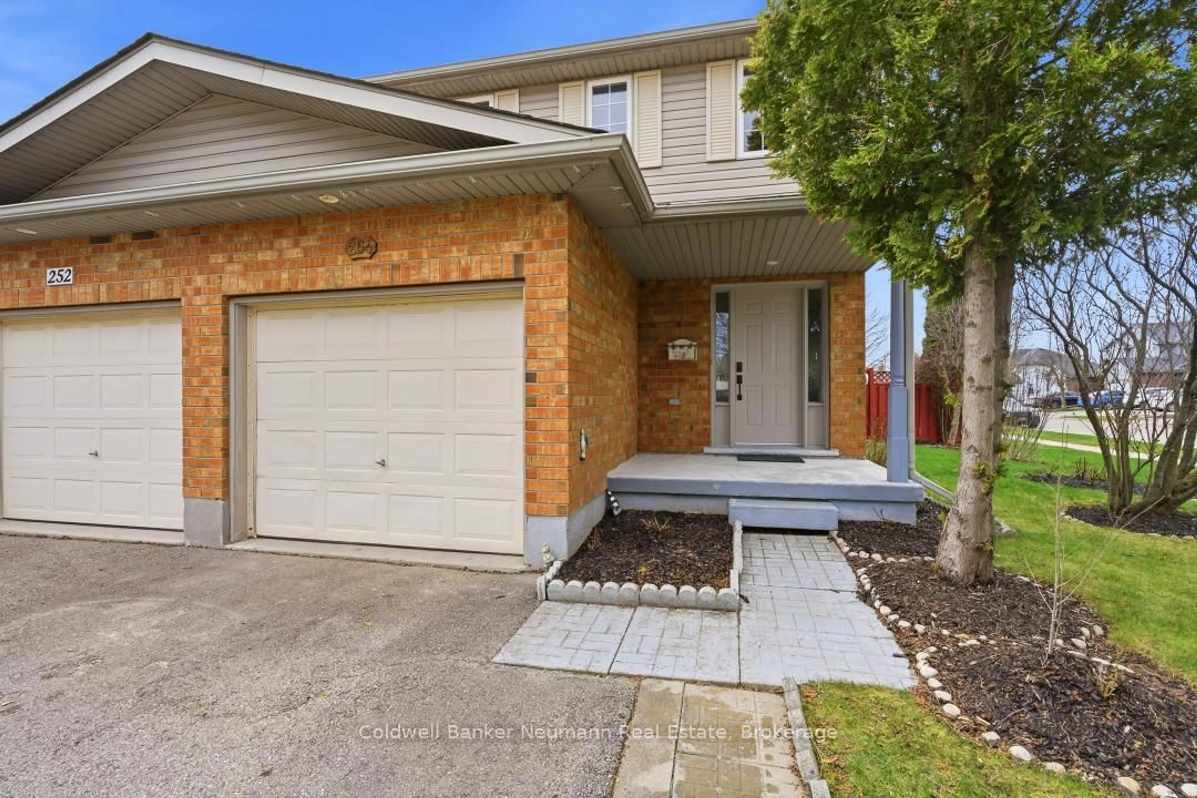 Home with brick exterior material, street for 254 Silurian Dr, Guelph Ontario N1E 7B8
