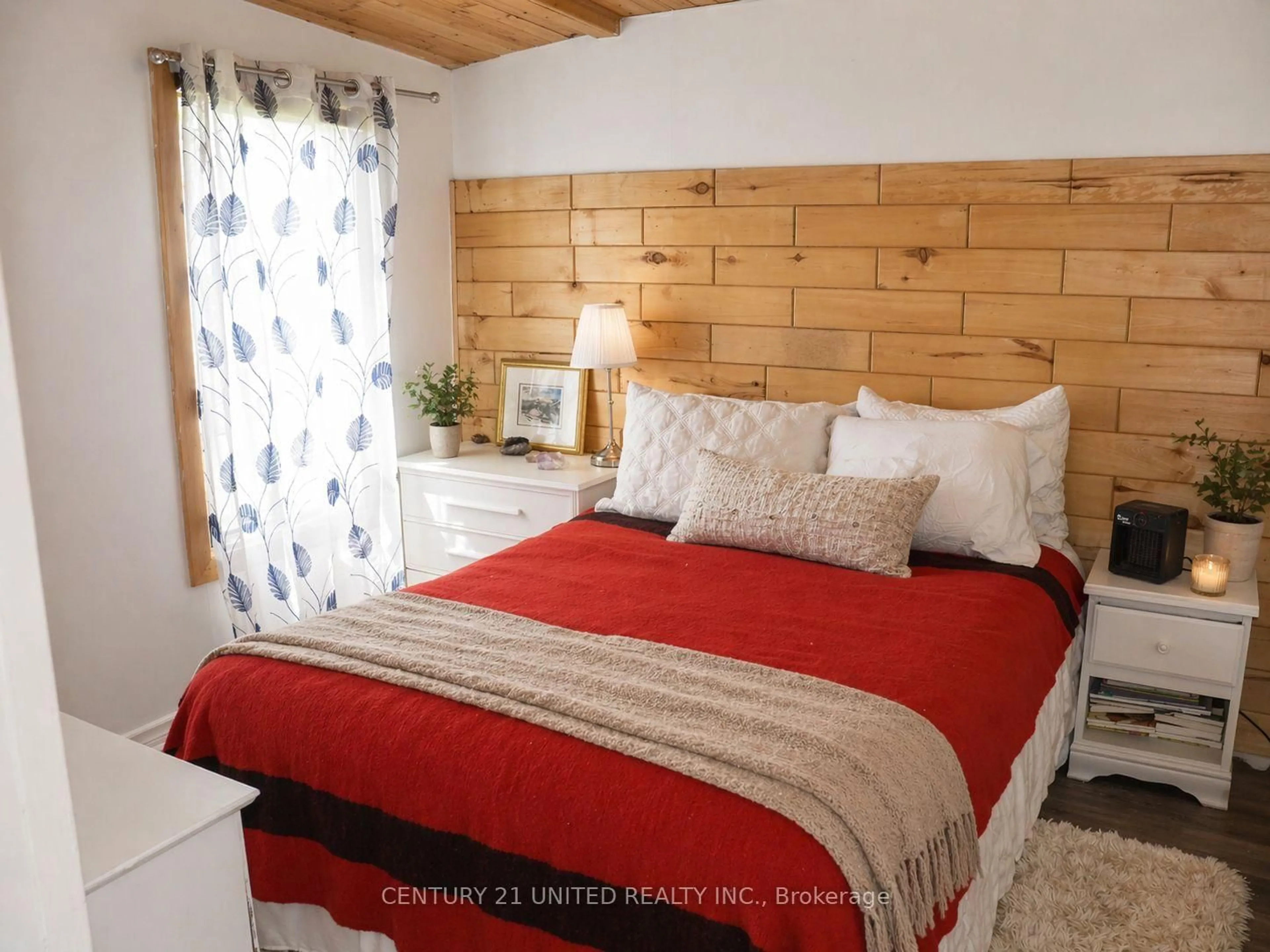 Bedroom with bed, wood/laminate floor for 106 Lakeview Cres, North Kawartha Ontario K0L 1A0