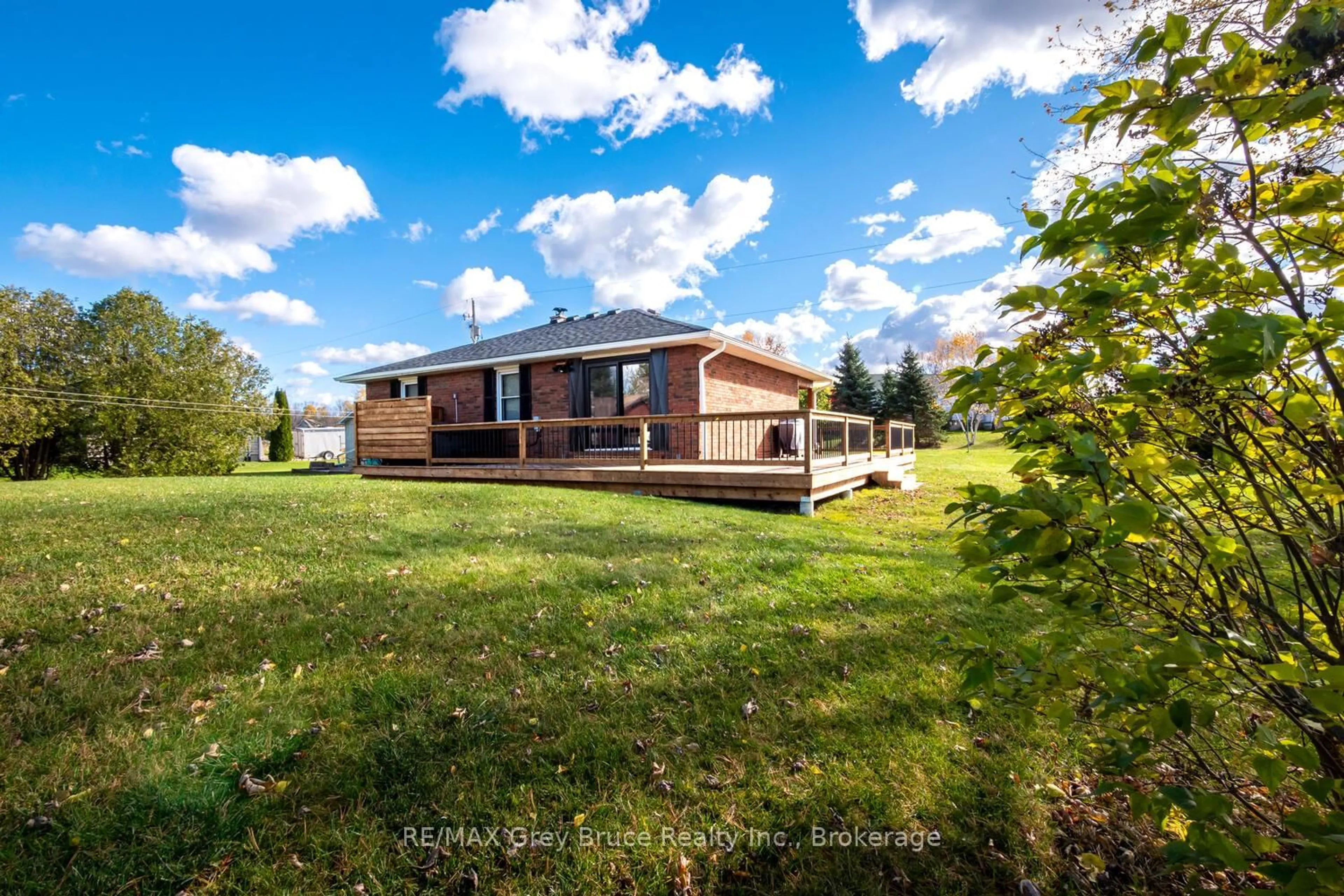 A pic from outside/outdoor area/front of a property/back of a property/a pic from drone, water/lake/river/ocean view for 105 John St, Georgian Bluffs Ontario N0H 2T0