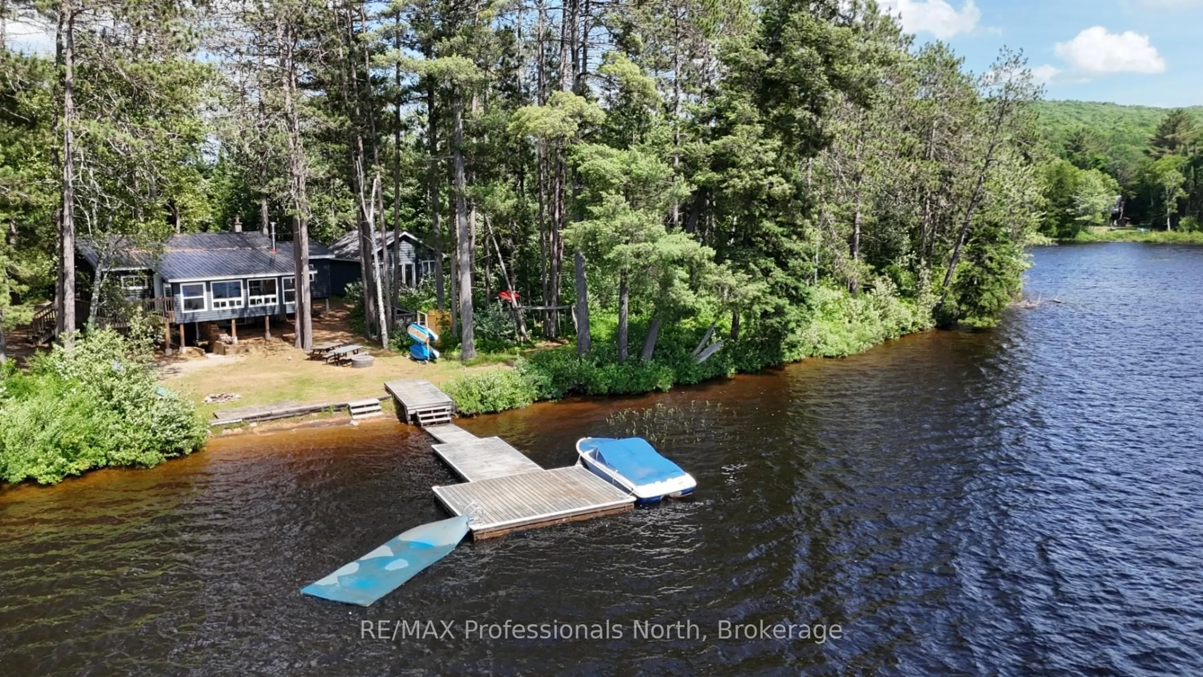 A pic from outside/outdoor area/front of a property/back of a property/a pic from drone, water/lake/river/ocean view for 1053 Cheerful Lane, Dysart et al Ontario K0L 1M1