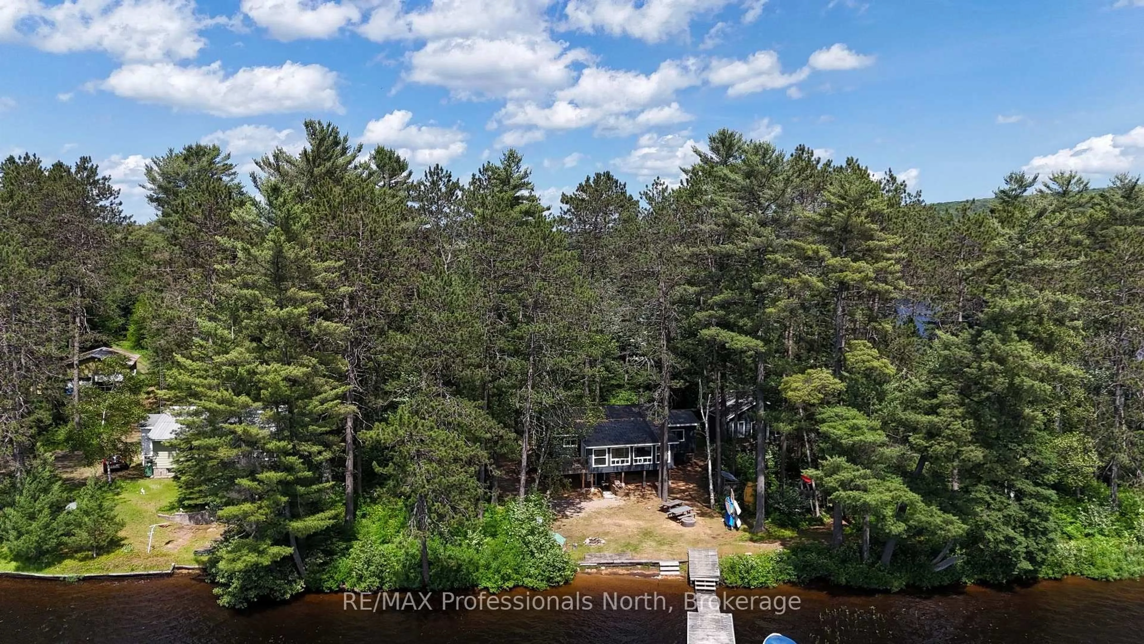 A pic from outside/outdoor area/front of a property/back of a property/a pic from drone, water/lake/river/ocean view for 1053 Cheerful Lane, Dysart et al Ontario K0L 1M1