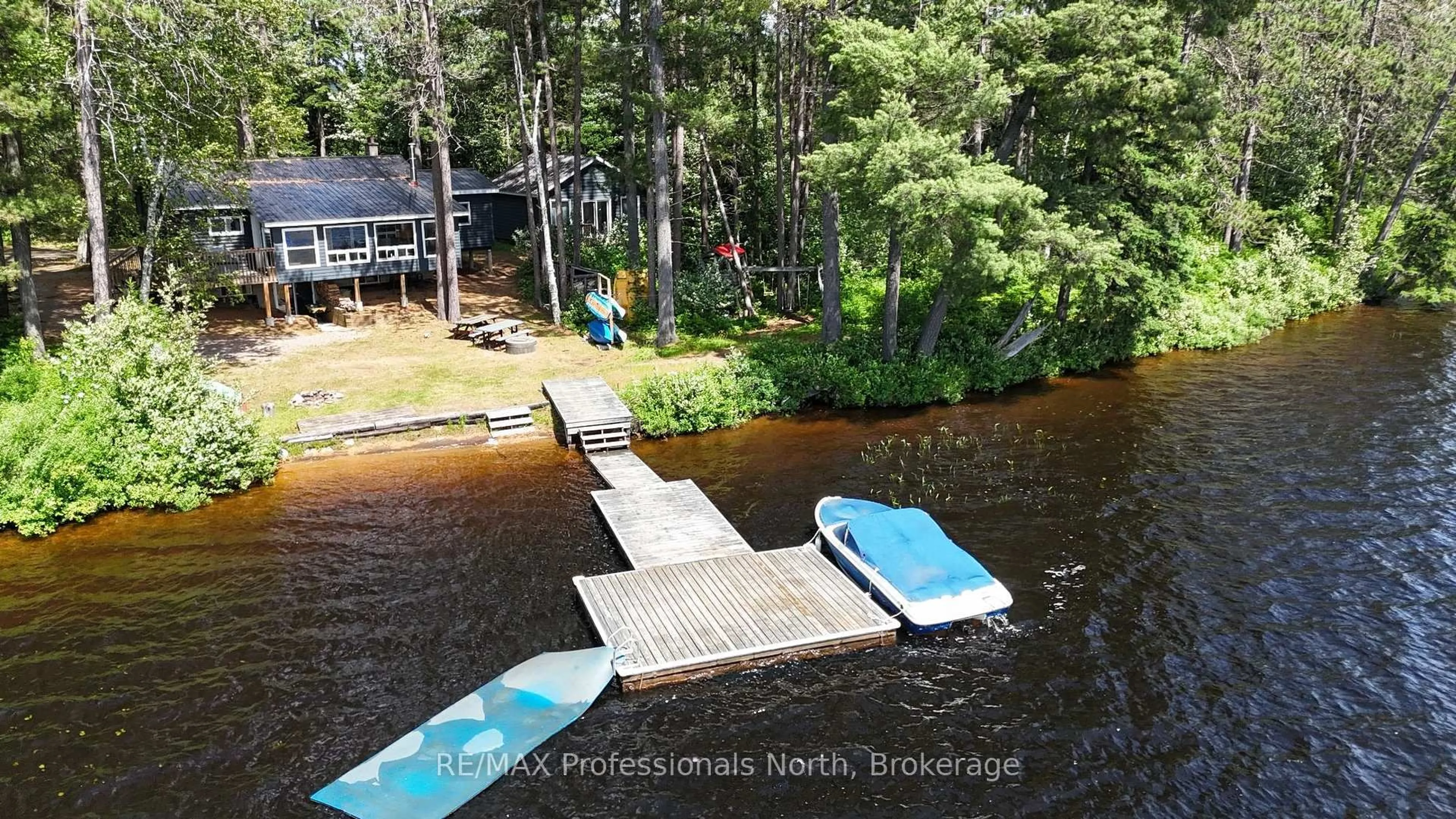 A pic from outside/outdoor area/front of a property/back of a property/a pic from drone, water/lake/river/ocean view for 1053 Cheerful Lane, Dysart et al Ontario K0L 1M1