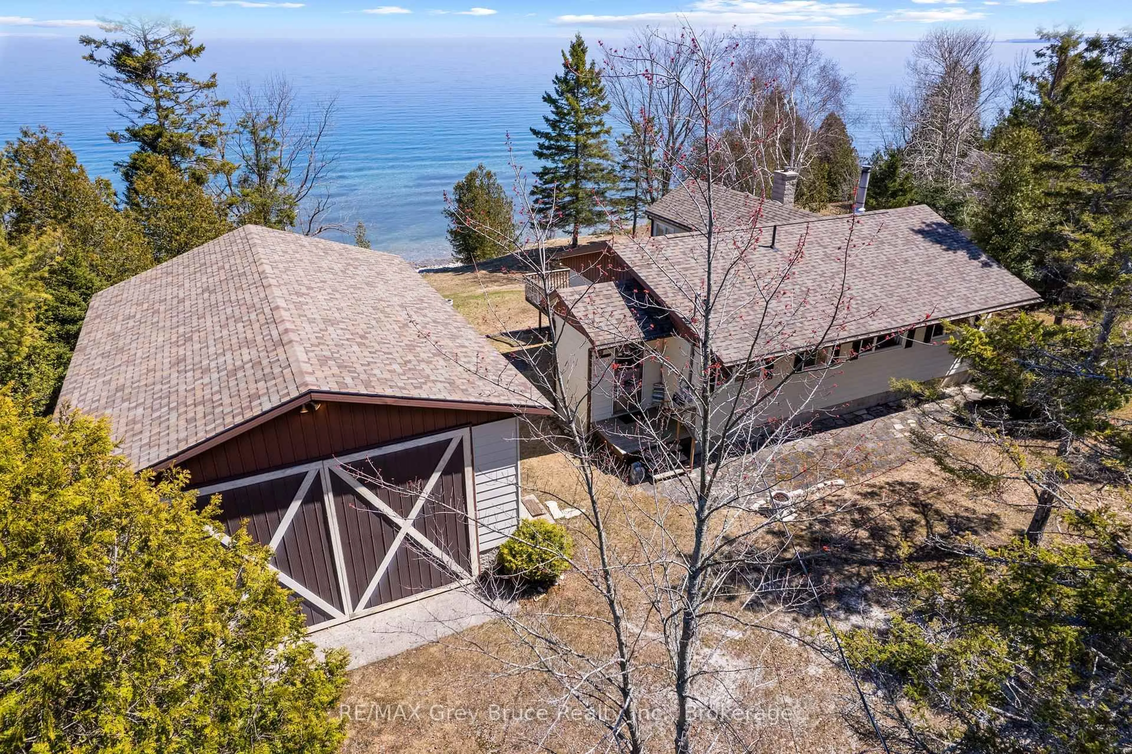 A pic from outside/outdoor area/front of a property/back of a property/a pic from drone, water/lake/river/ocean view for 102 Carter Rd, Northern Bruce Peninsula Ontario N0H 1W0