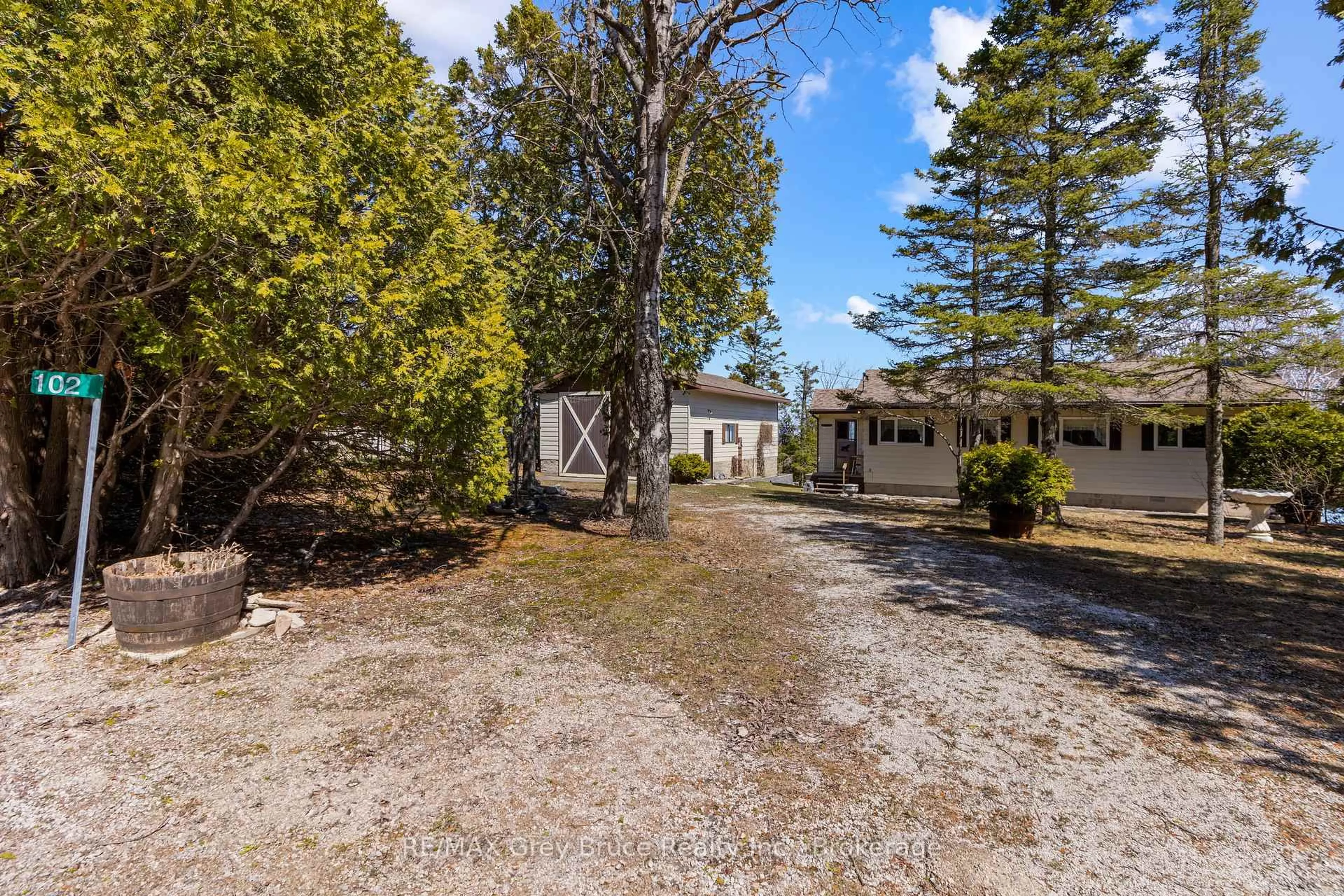 A pic from outside/outdoor area/front of a property/back of a property/a pic from drone, unknown for 102 Carter Rd, Northern Bruce Peninsula Ontario N0H 1W0