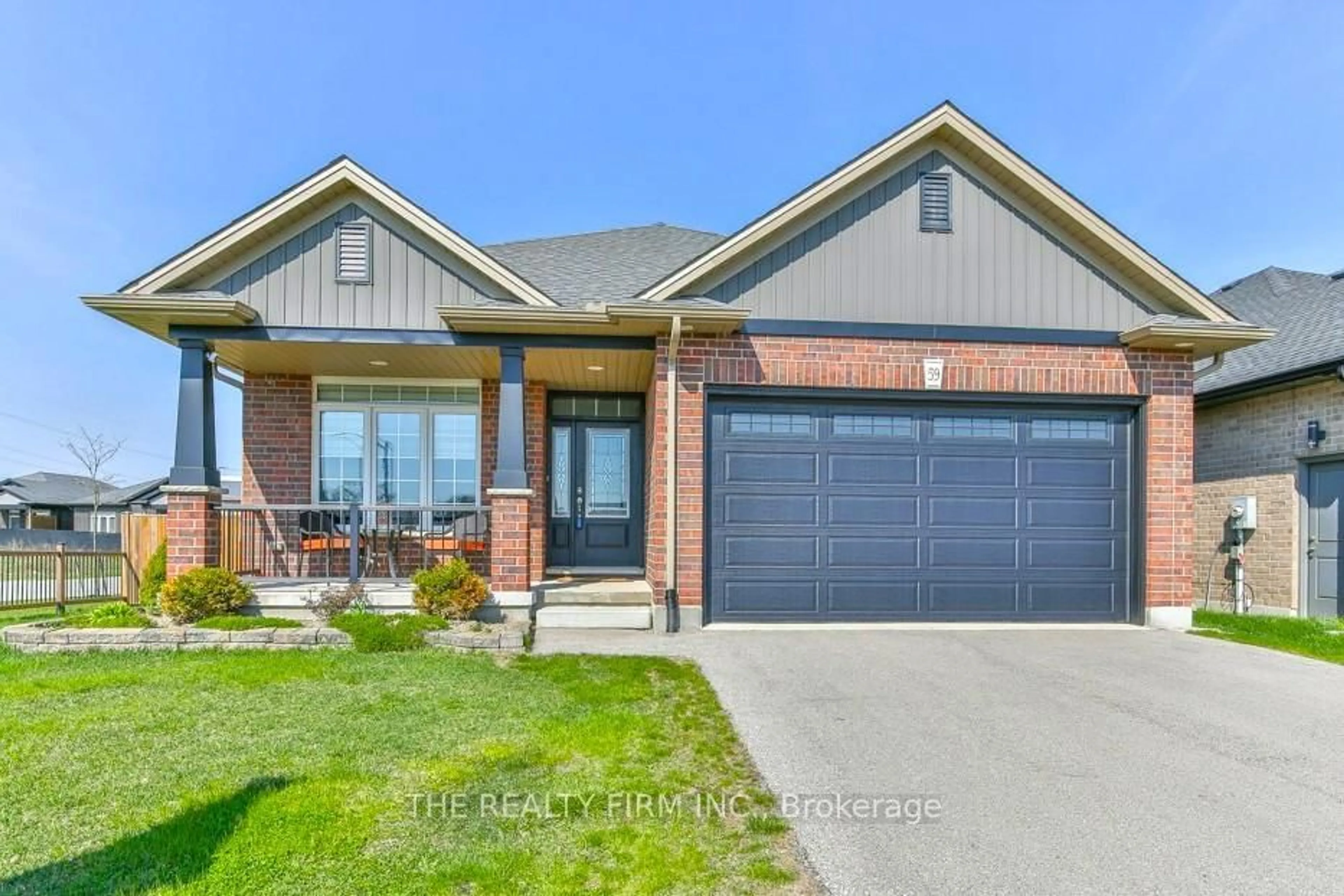 Home with brick exterior material, street for 59 Freeman Lane, Central Elgin Ontario N5P 0E5