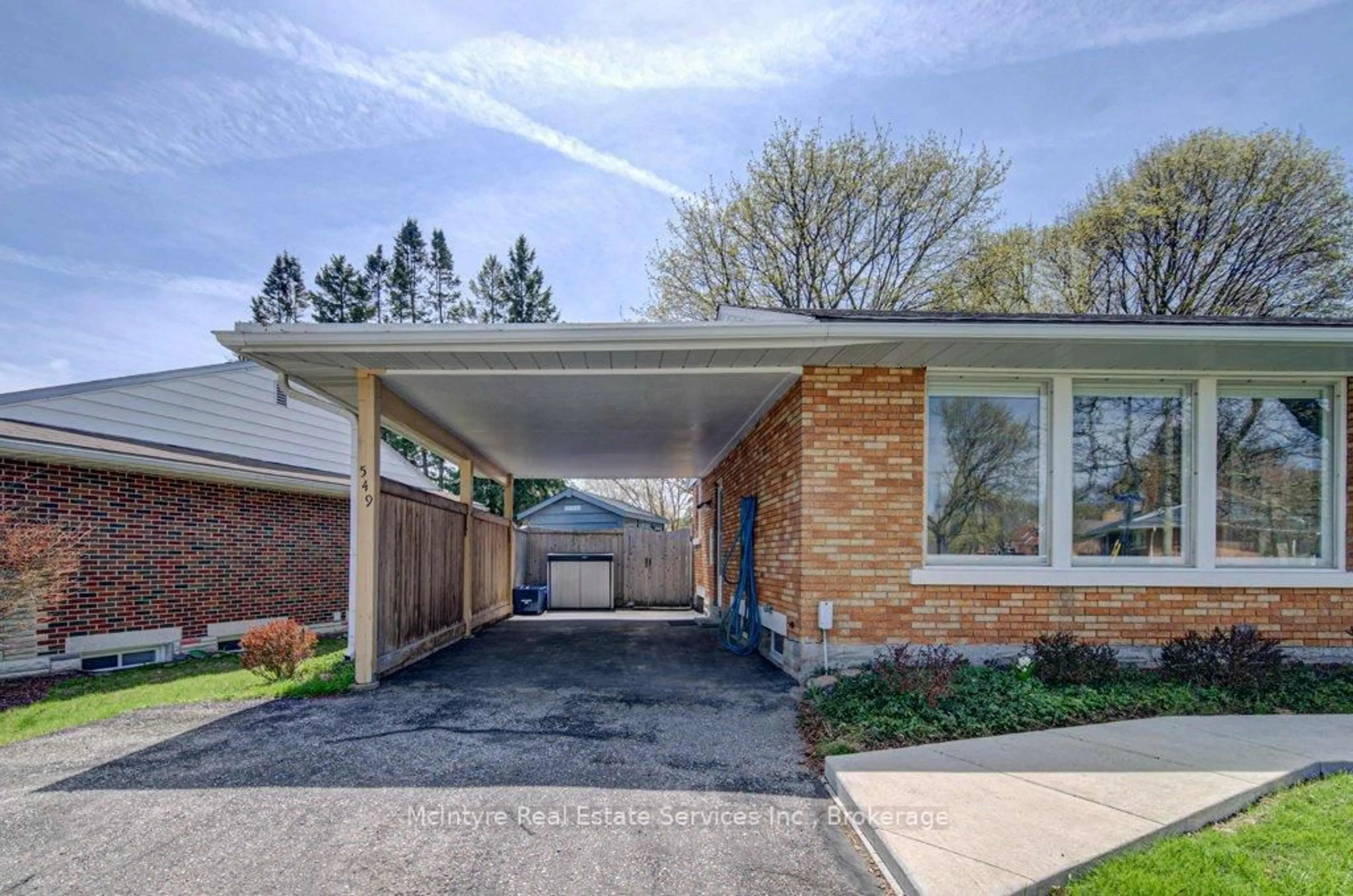Home with brick exterior material, street for 549 Dunbar Rd, Kitchener Ontario N2M 2X1