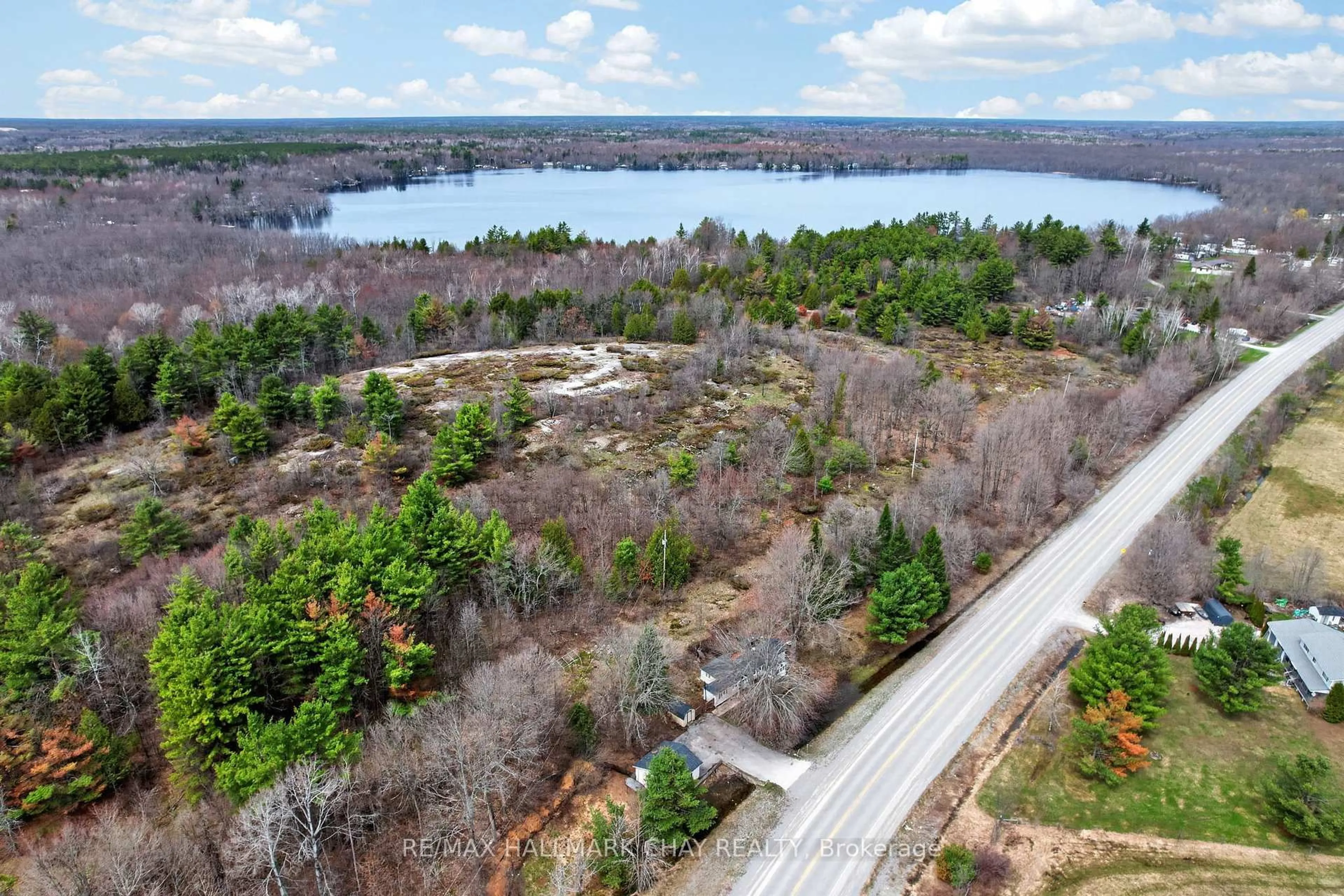 A pic from outside/outdoor area/front of a property/back of a property/a pic from drone, water/lake/river/ocean view for 127 Monck Rd, Kawartha Lakes Ontario L0K 1W0