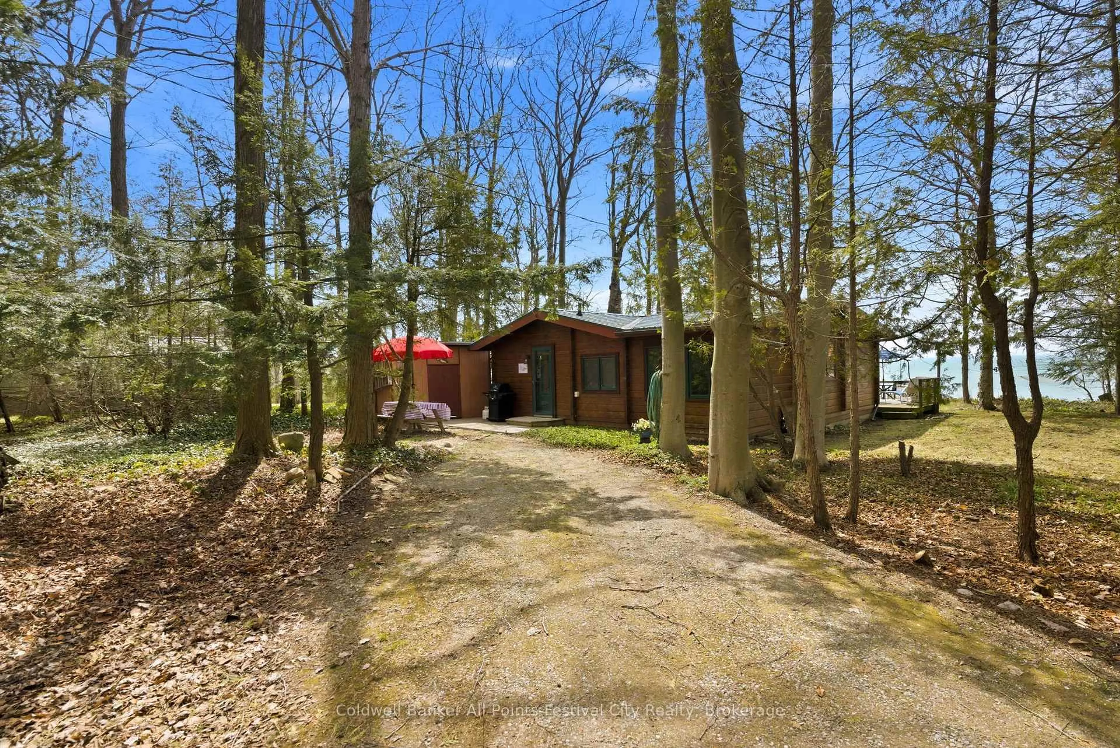 A pic from outside/outdoor area/front of a property/back of a property/a pic from drone, forest/trees view for 74515 Woodland Dr, Bluewater Ontario N0M 1G0
