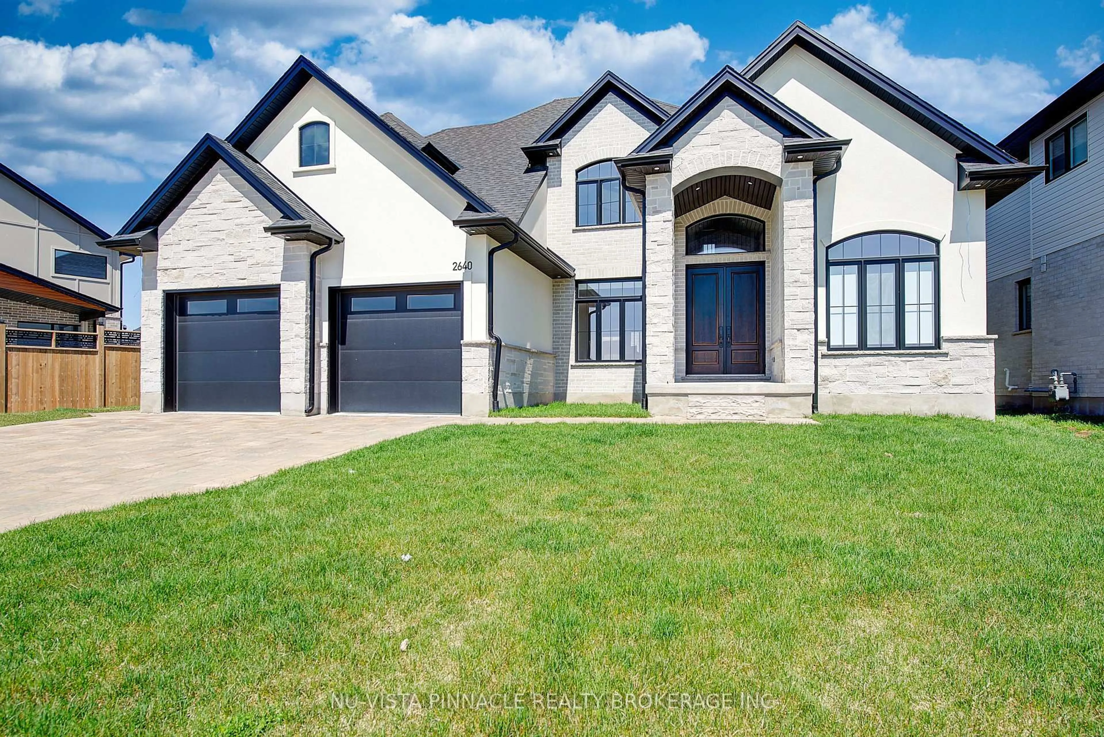 Home with brick exterior material, street for 2640 Heardcreek Tr, London North Ontario N6G 0Z8