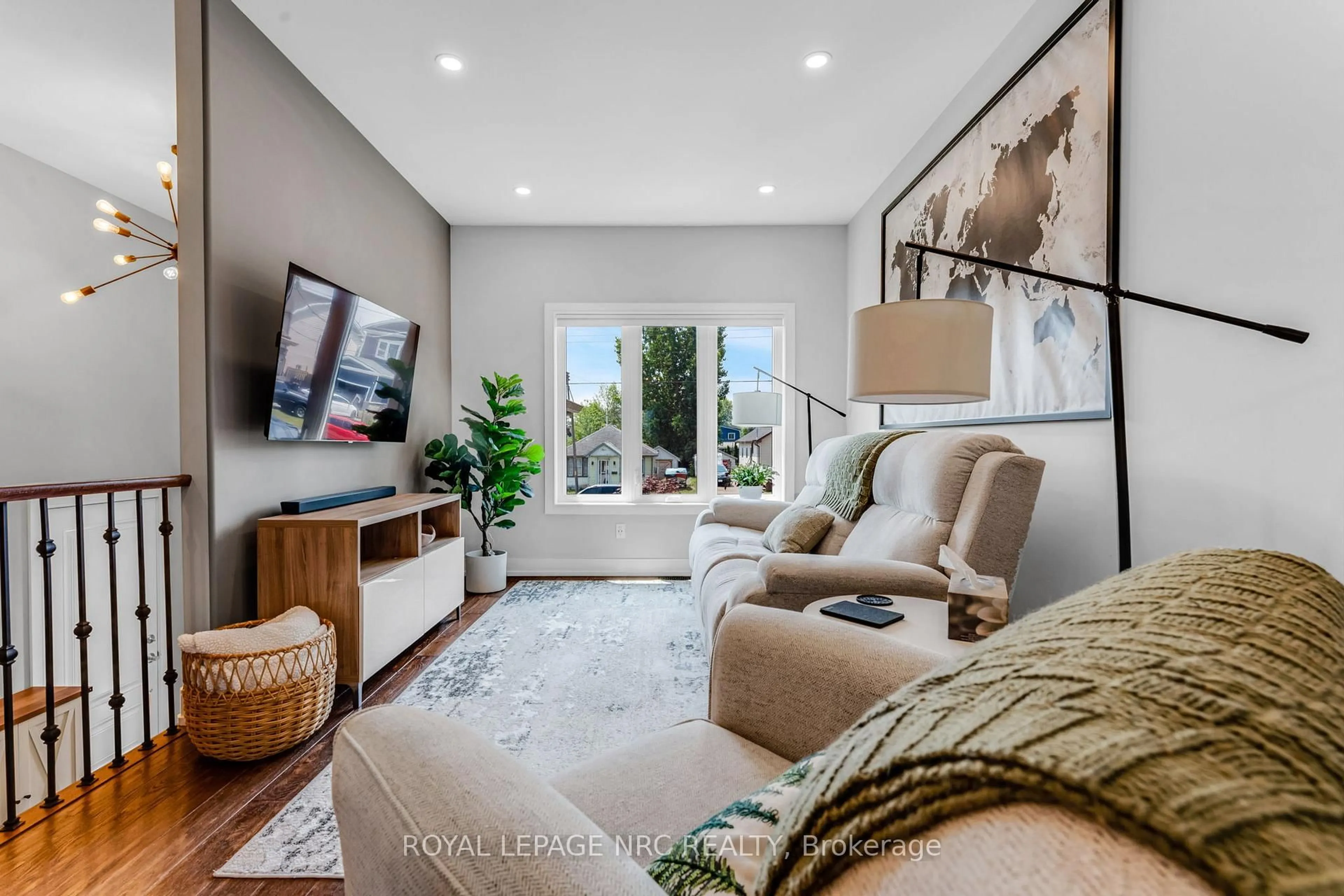 Living room with furniture, unknown for 18 Erie St, Welland Ontario L3B 5J7