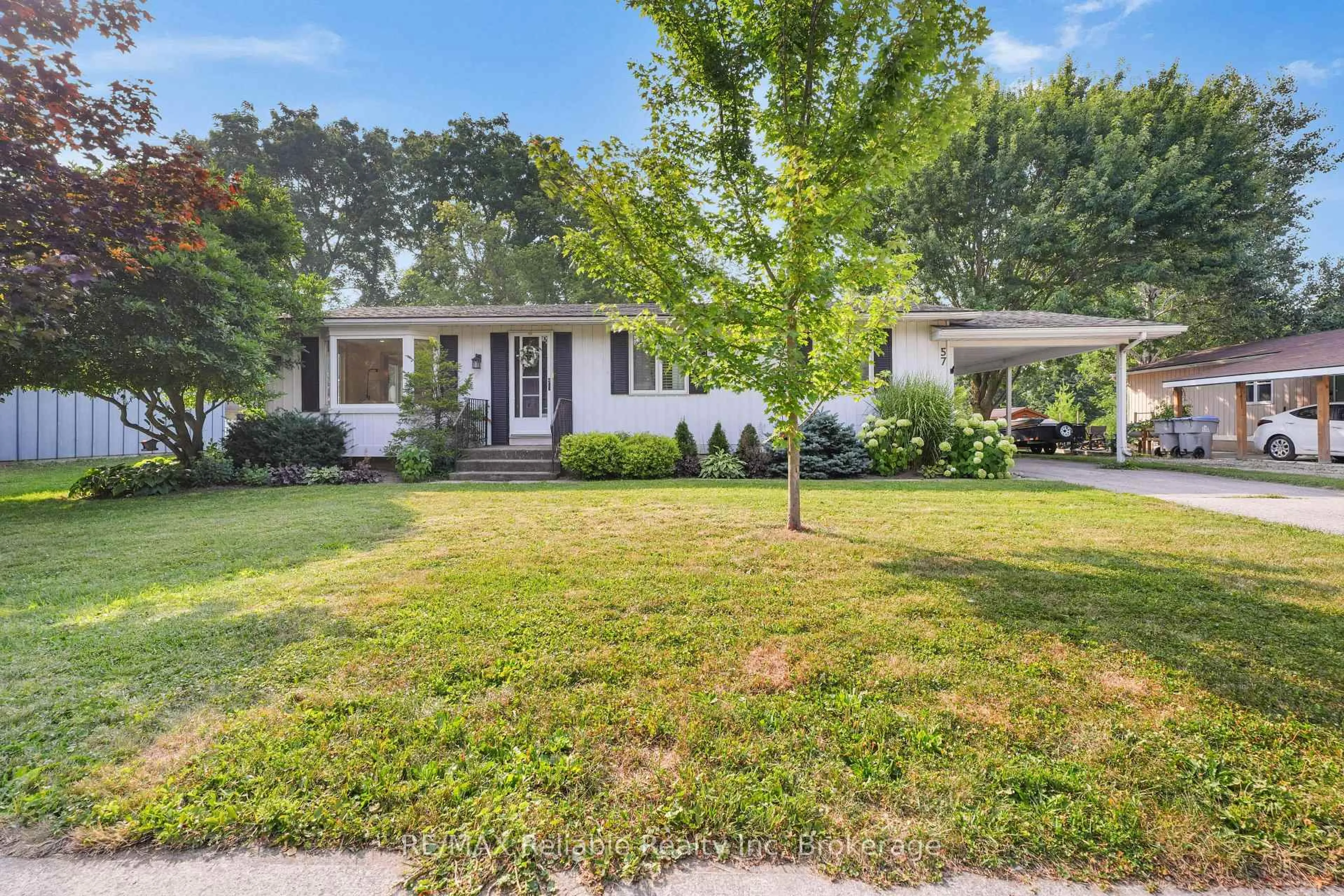 Home with vinyl exterior material, street for 57 Coleman St, Huron East Ontario N0K 1W0