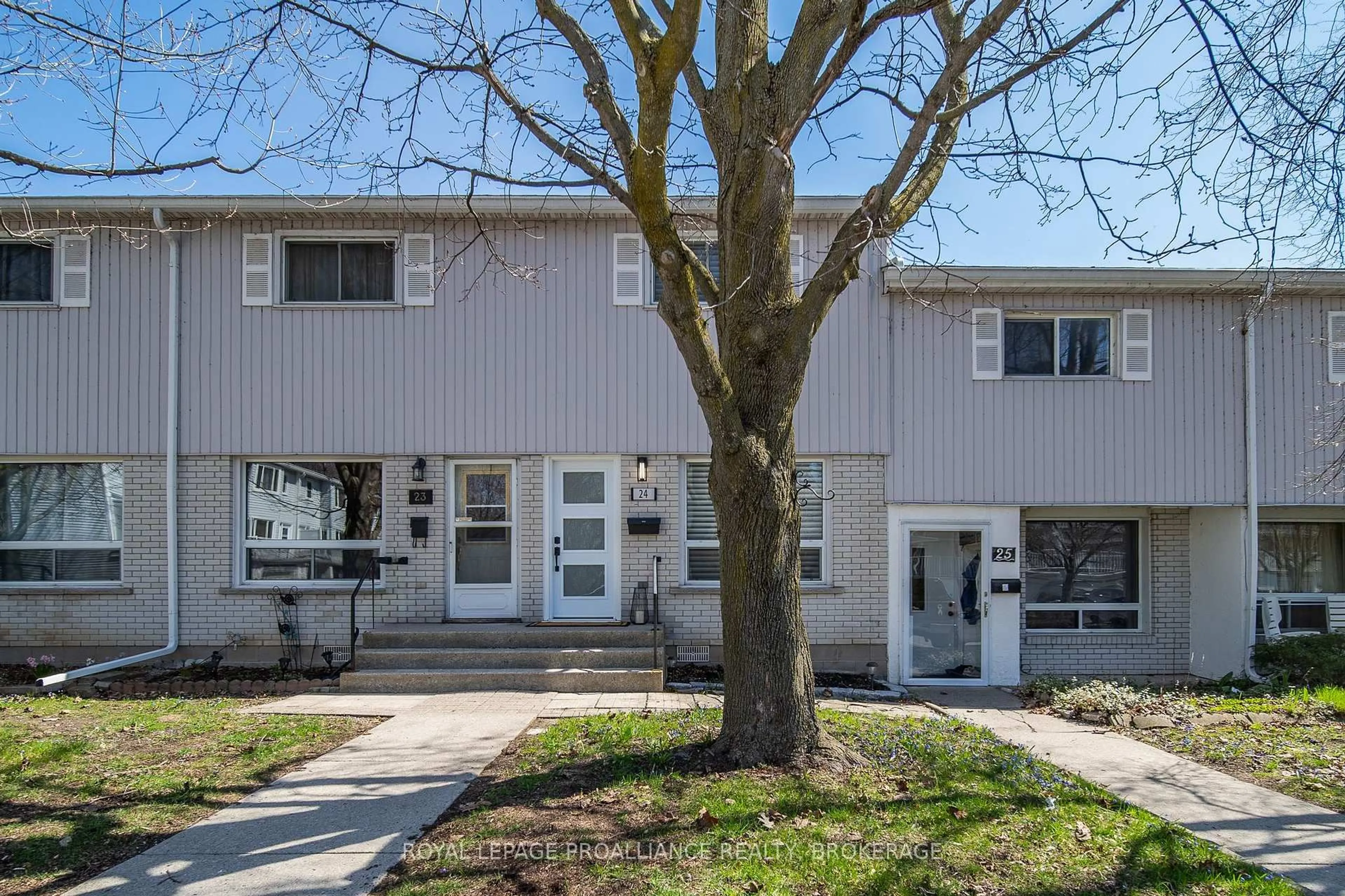 Home with vinyl exterior material, street for 4427 Bath Rd #24, Loyalist Ontario K7N 1A1