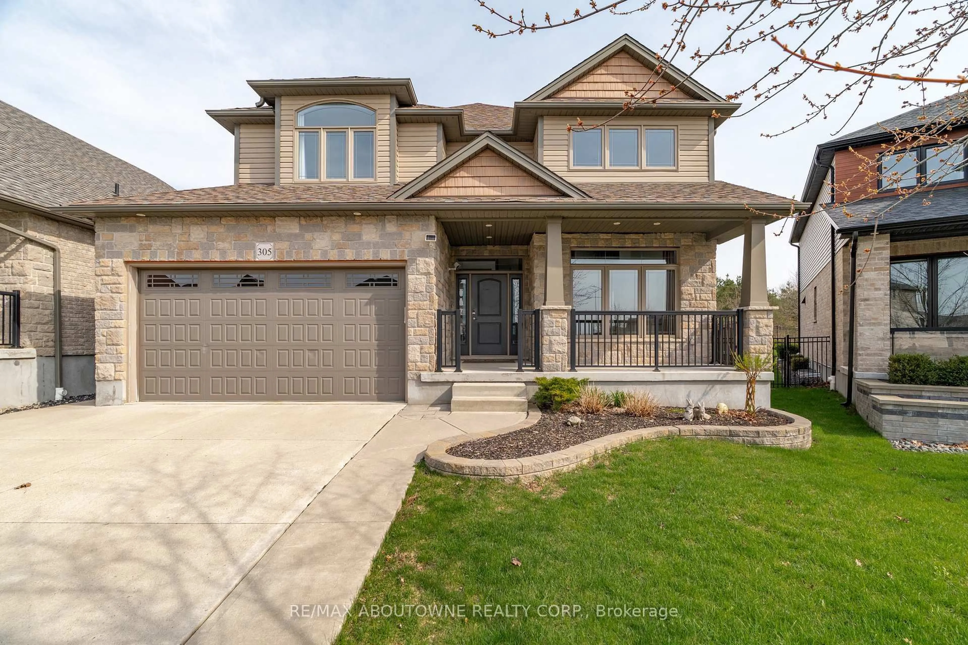 Home with brick exterior material, street for 305 Gosling Gdns, Guelph Ontario N1L 0M1