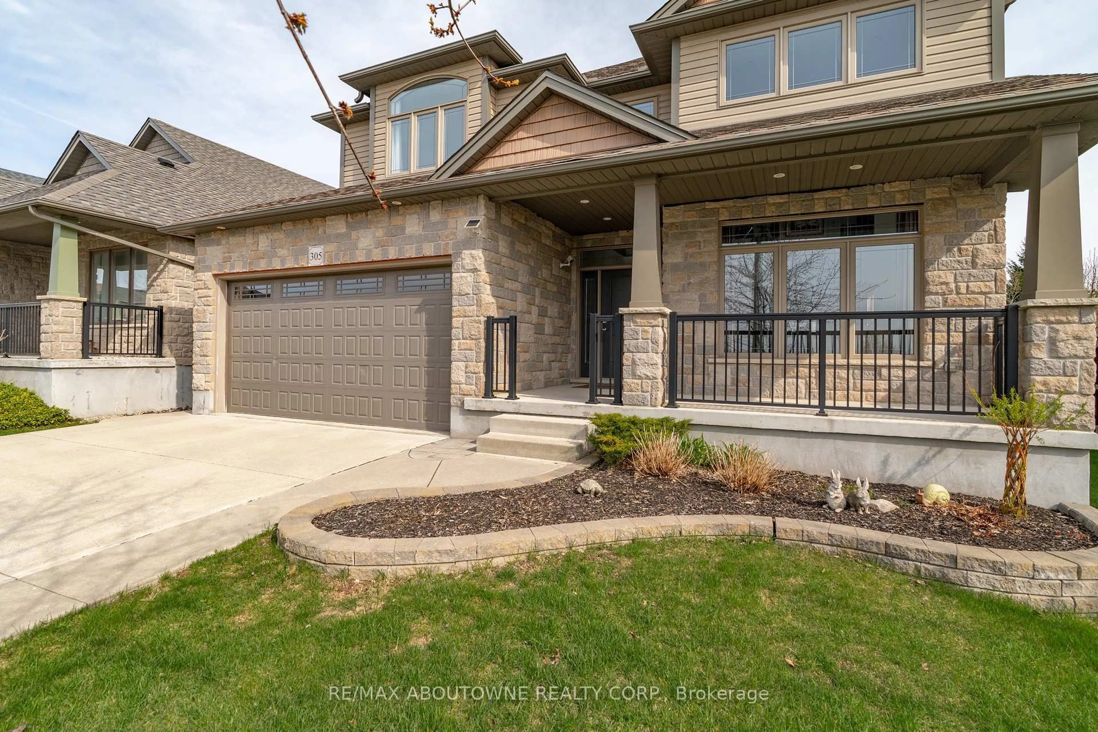 Home with brick exterior material, street for 305 Gosling Gdns, Guelph Ontario N1L 0M1