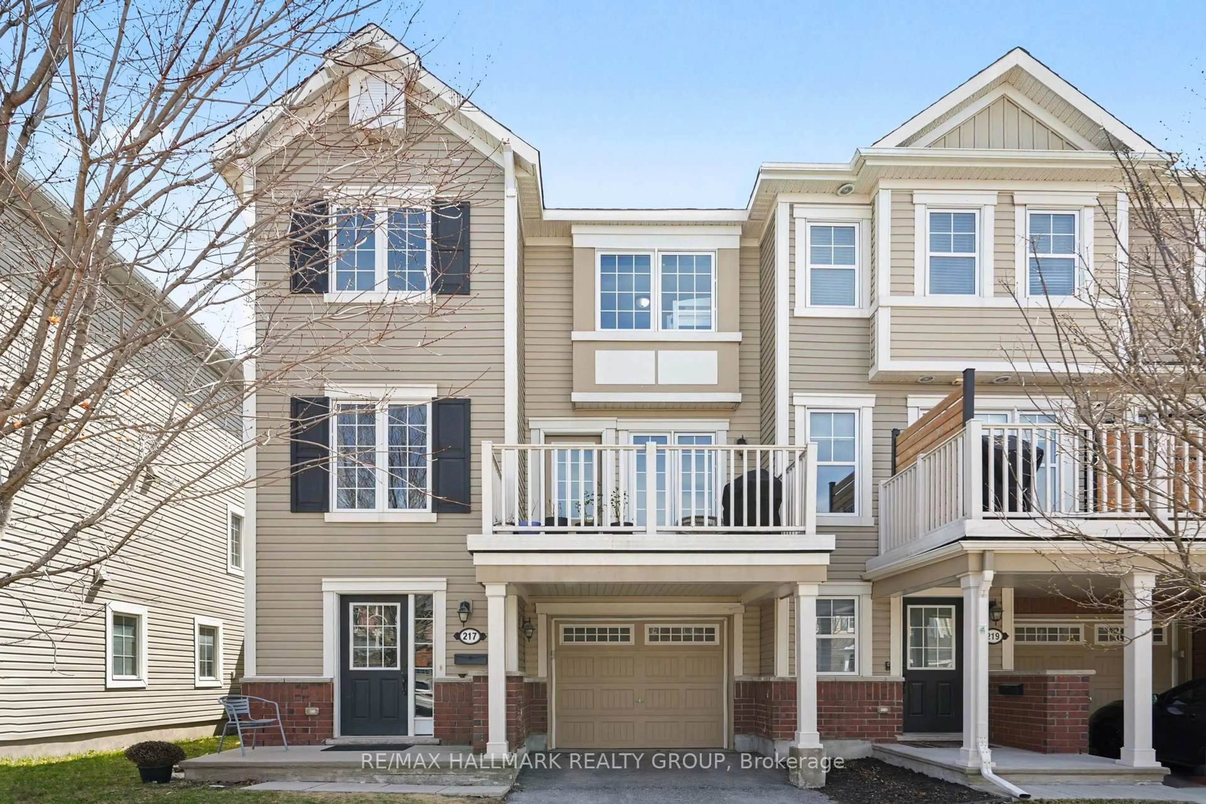 Home with vinyl exterior material, street for 217 Bensinger Way, Stittsville Ontario K2S 0P1