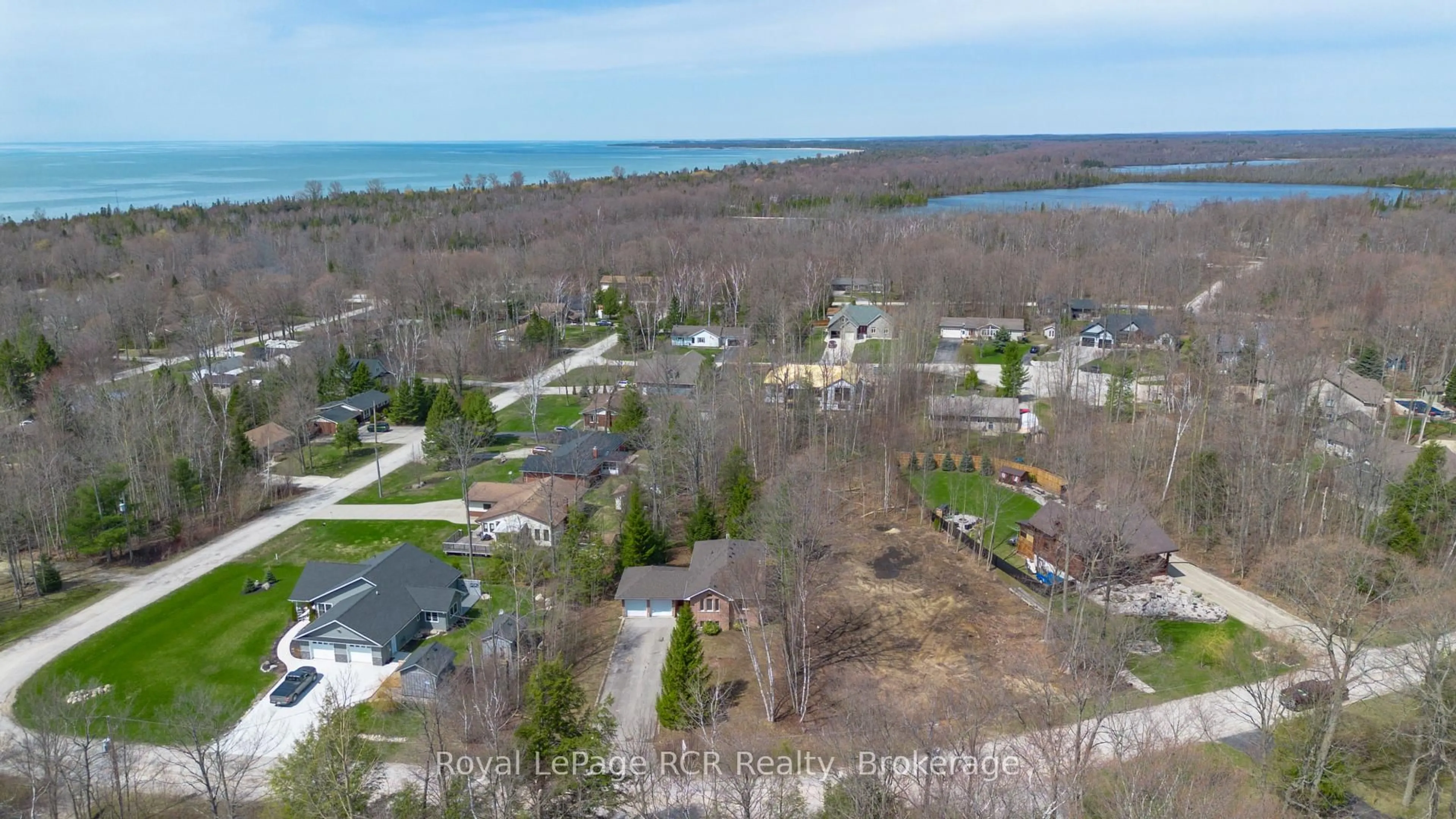 A pic from outside/outdoor area/front of a property/back of a property/a pic from drone, water/lake/river/ocean view for 43 Graham Cres, South Bruce Peninsula Ontario N0H 2G0