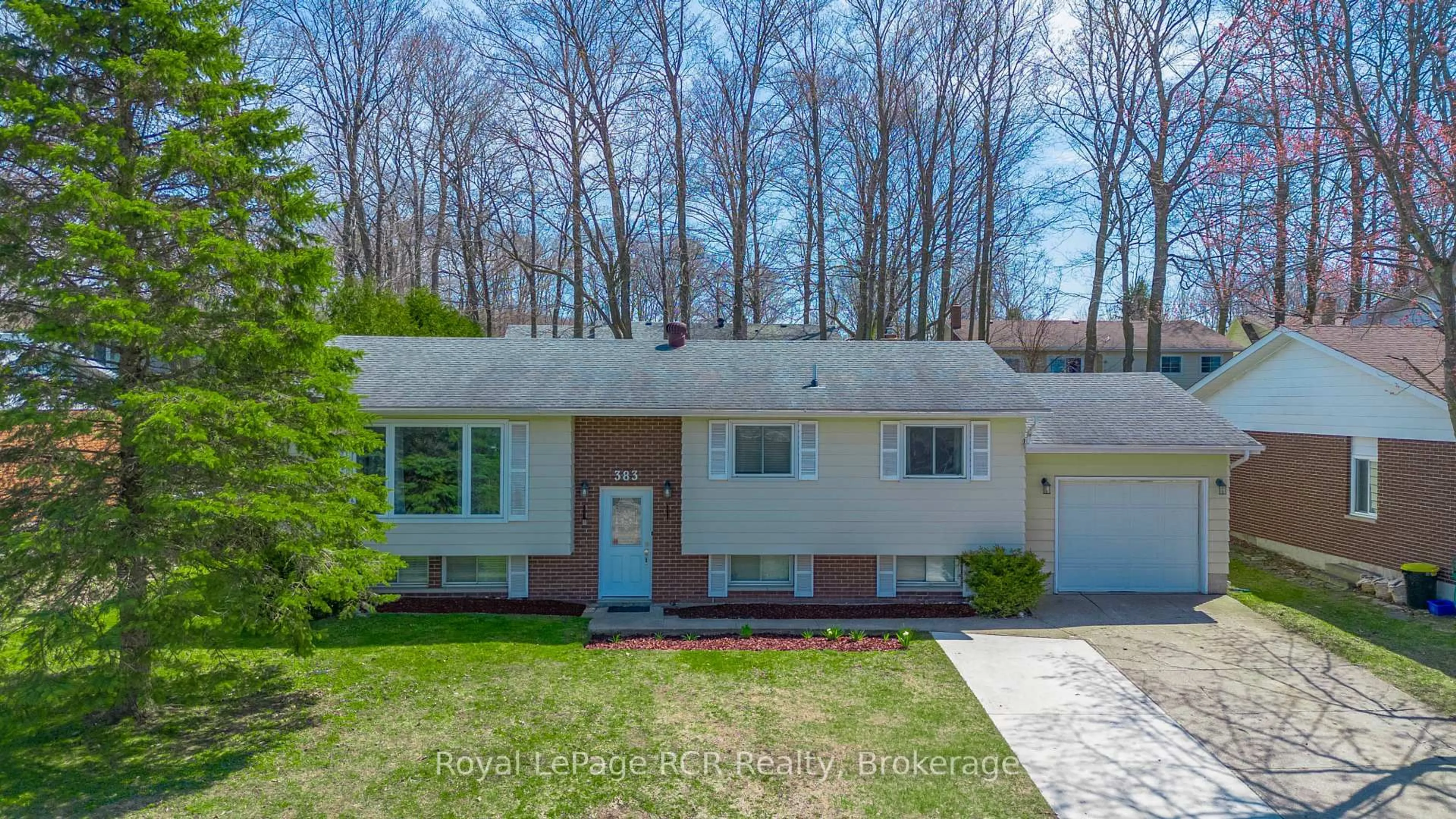 Home with vinyl exterior material, street for 383 WELLINGTON St, Saugeen Shores Ontario N0H 2C4