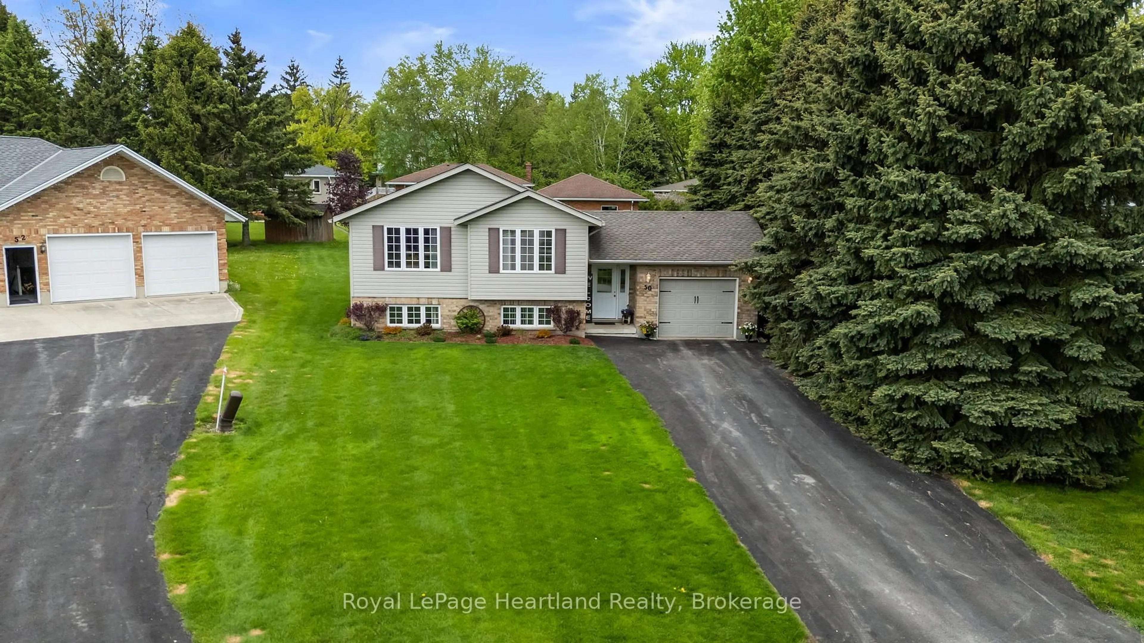 A pic from outside/outdoor area/front of a property/back of a property/a pic from drone, street for 50 MCDONALD Dr, Huron East Ontario N0G 1H0