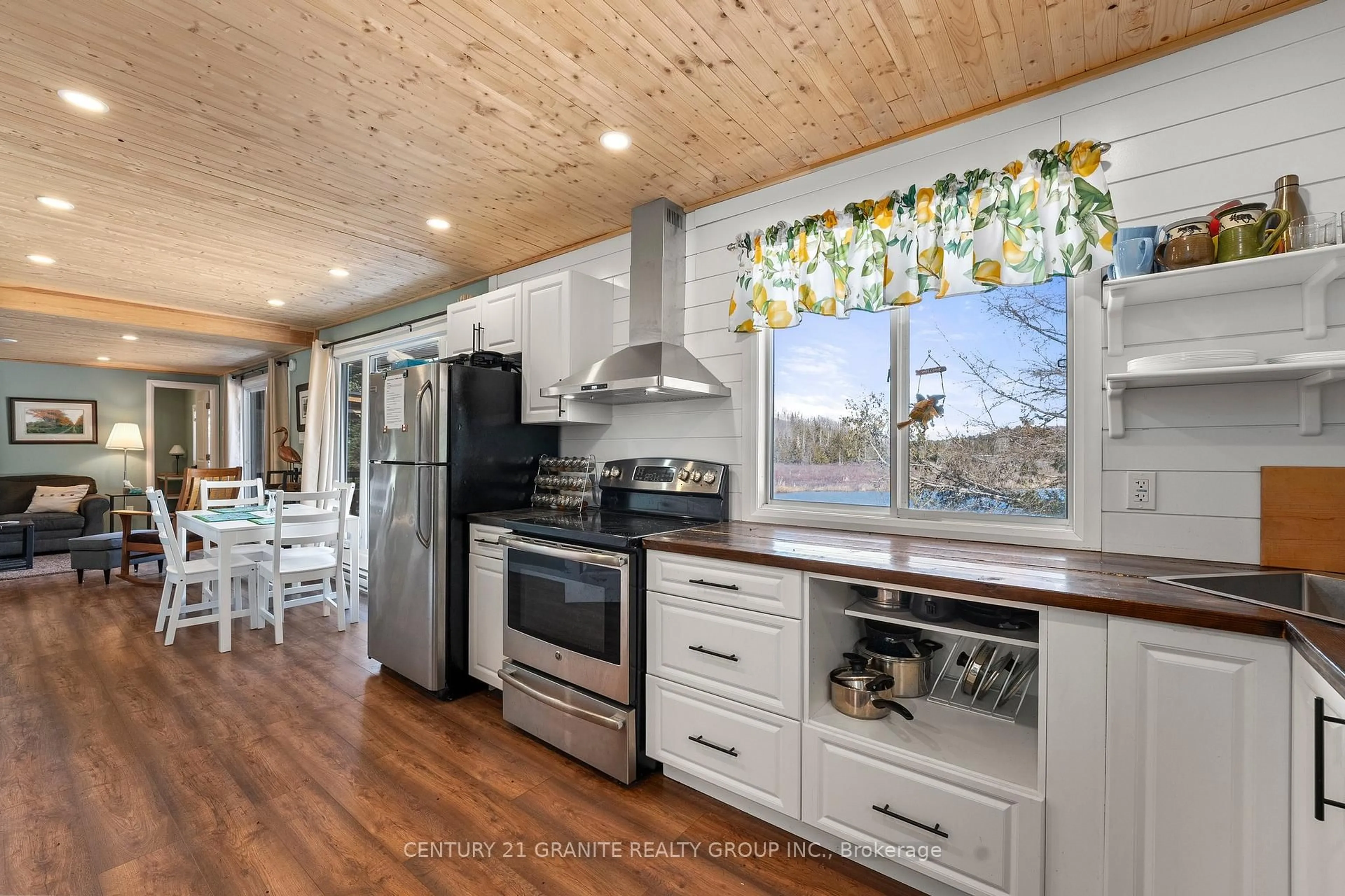 Open concept kitchen, wood/laminate floor for 77B Lavallee Creek Dr, Coe Hill Ontario K0L 1P0