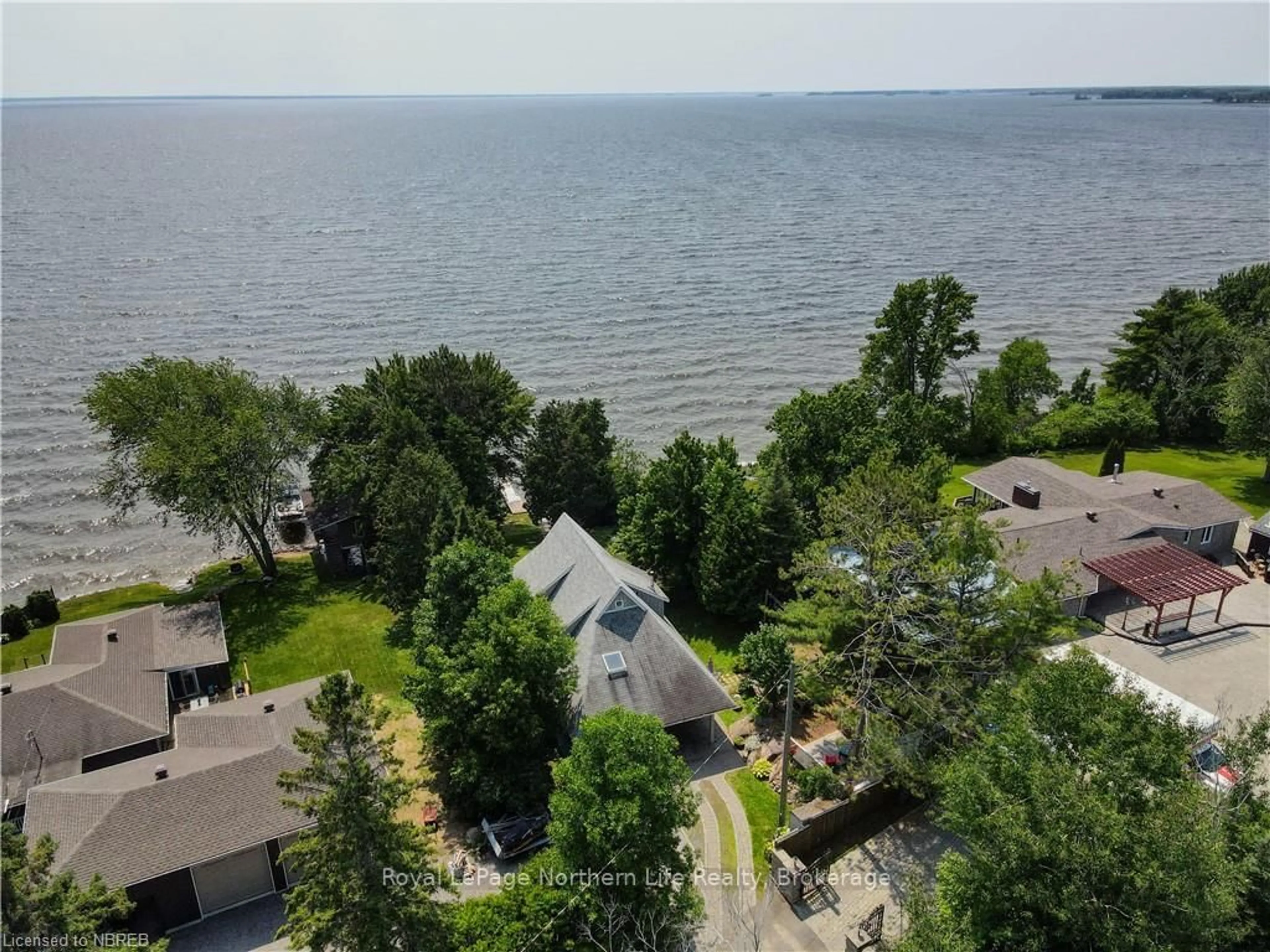A pic from outside/outdoor area/front of a property/back of a property/a pic from drone, water/lake/river/ocean view for 220 Du Lac Prom, West Nipissing Ontario P2B 2Y1