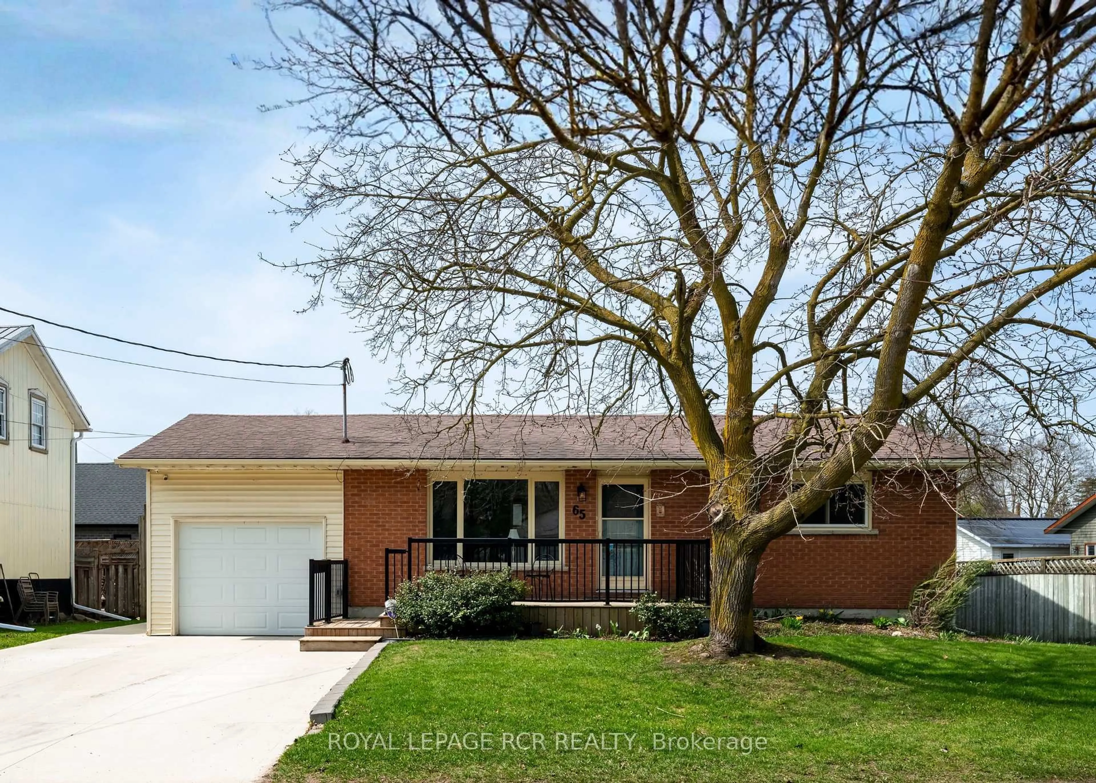 Home with brick exterior material, street for 65 Marklane St, Minto Ontario N0G 1Z0