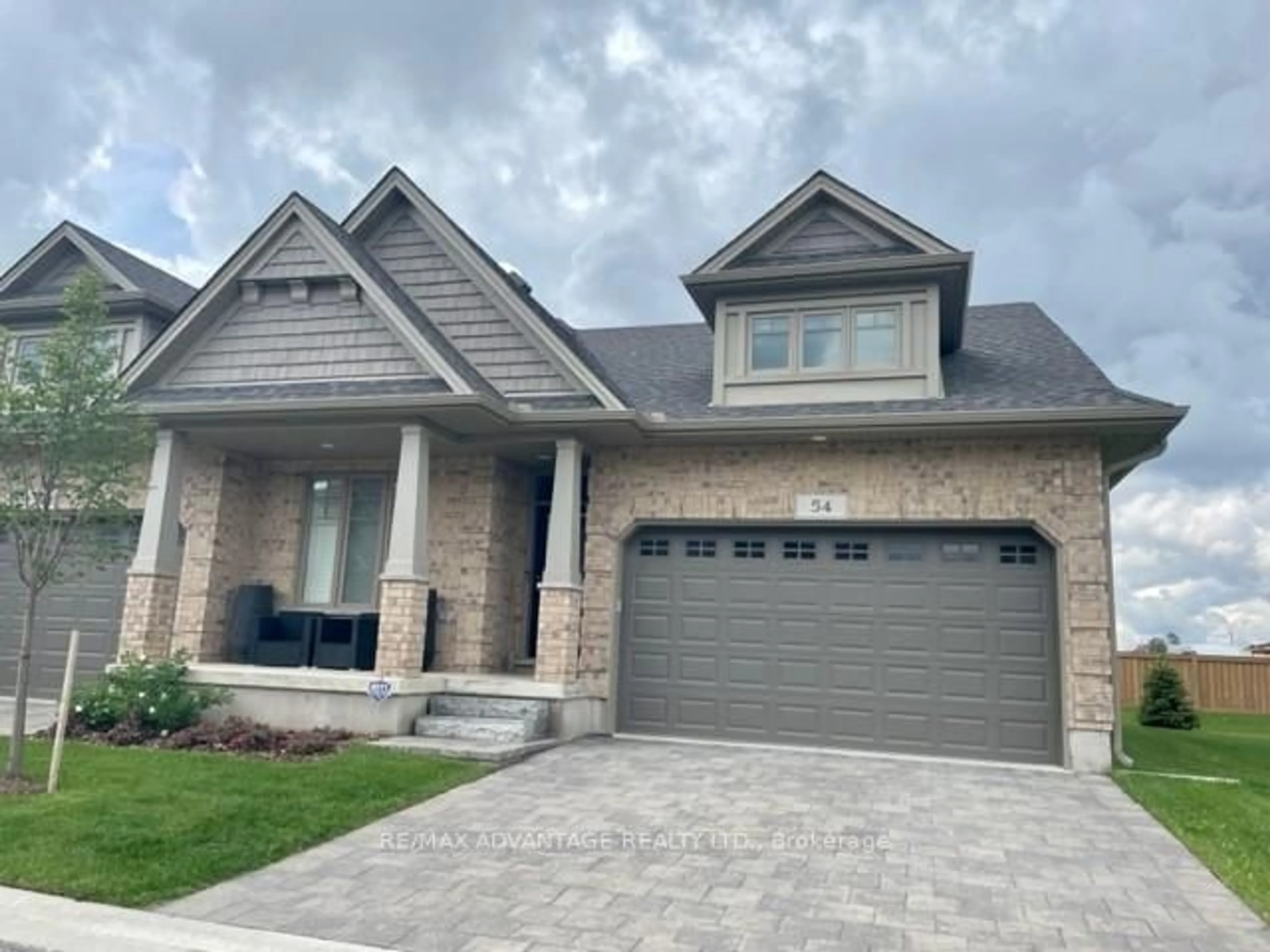 Home with brick exterior material, street for 2650 Buroak Dr #54, London North Ontario N6G 0Z9