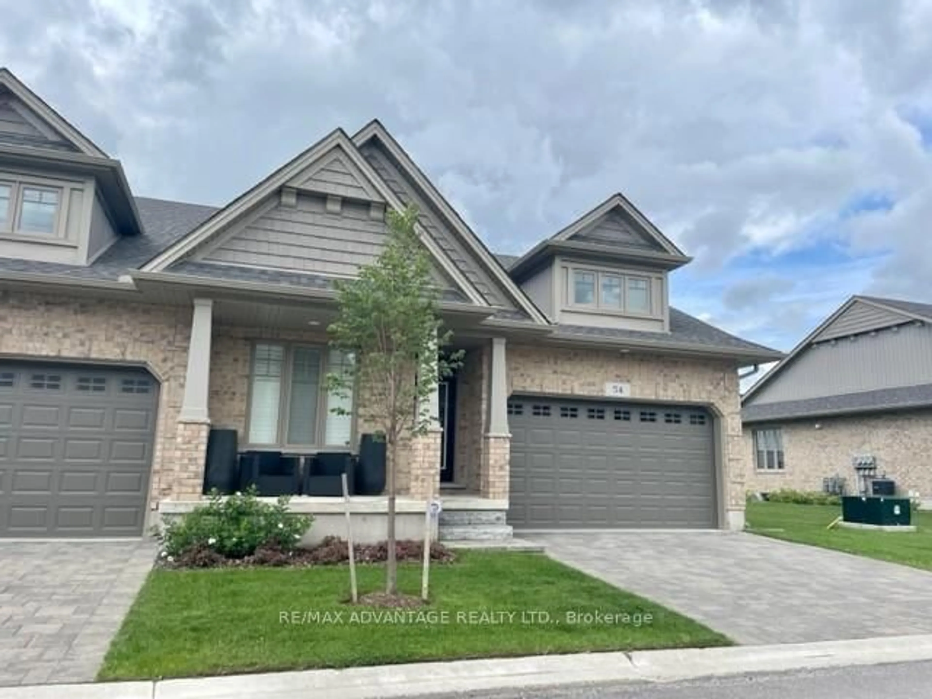 Home with brick exterior material, street for 2650 Buroak Dr #54, London North Ontario N6G 0Z9