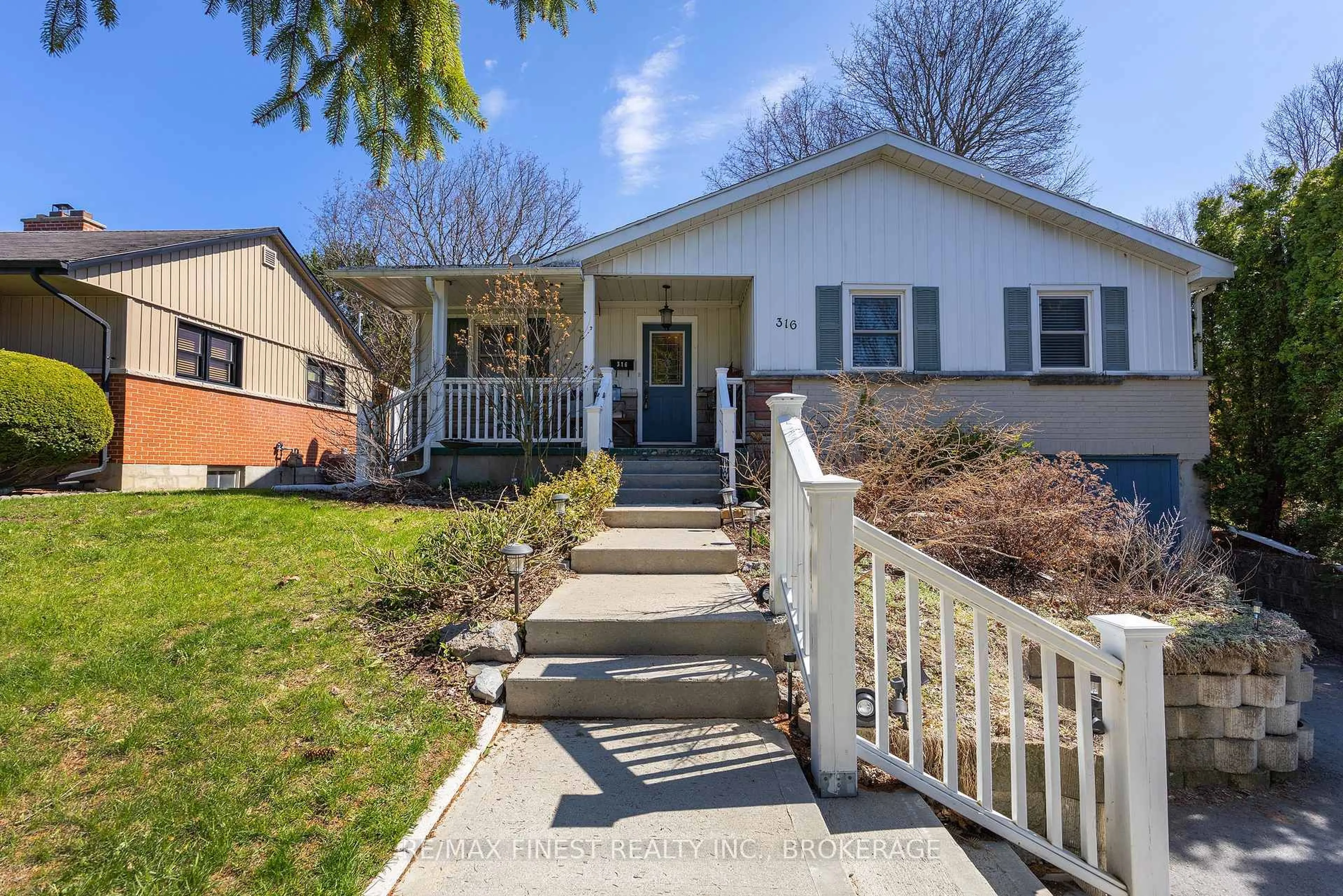 Home with vinyl exterior material, street for 316 Glengarry Rd, Kingston Ontario K7M 3J9