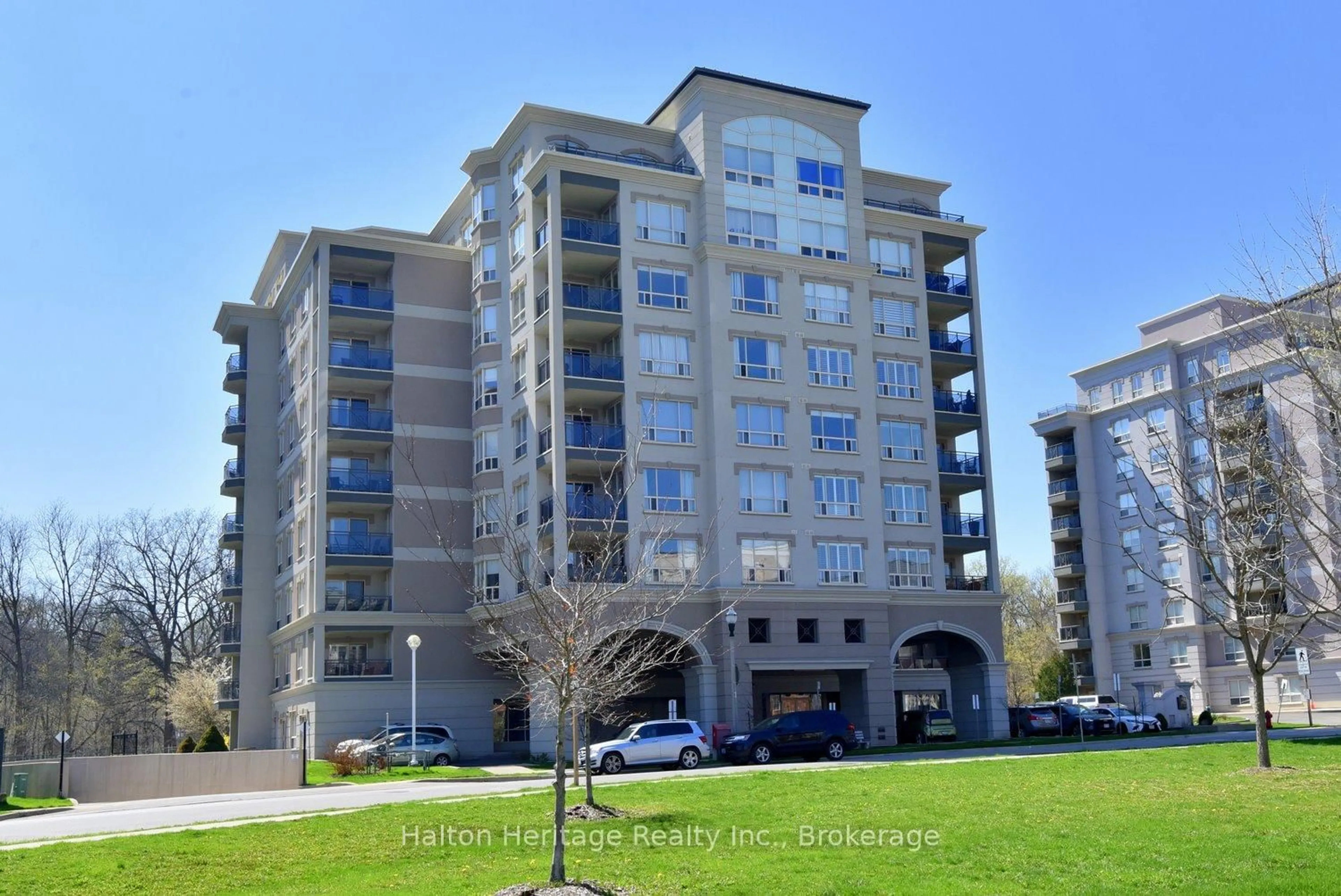 A pic from outside/outdoor area/front of a property/back of a property/a pic from drone, building for 3000 Creekside Dr #501, Hamilton Ontario L9H 7S8