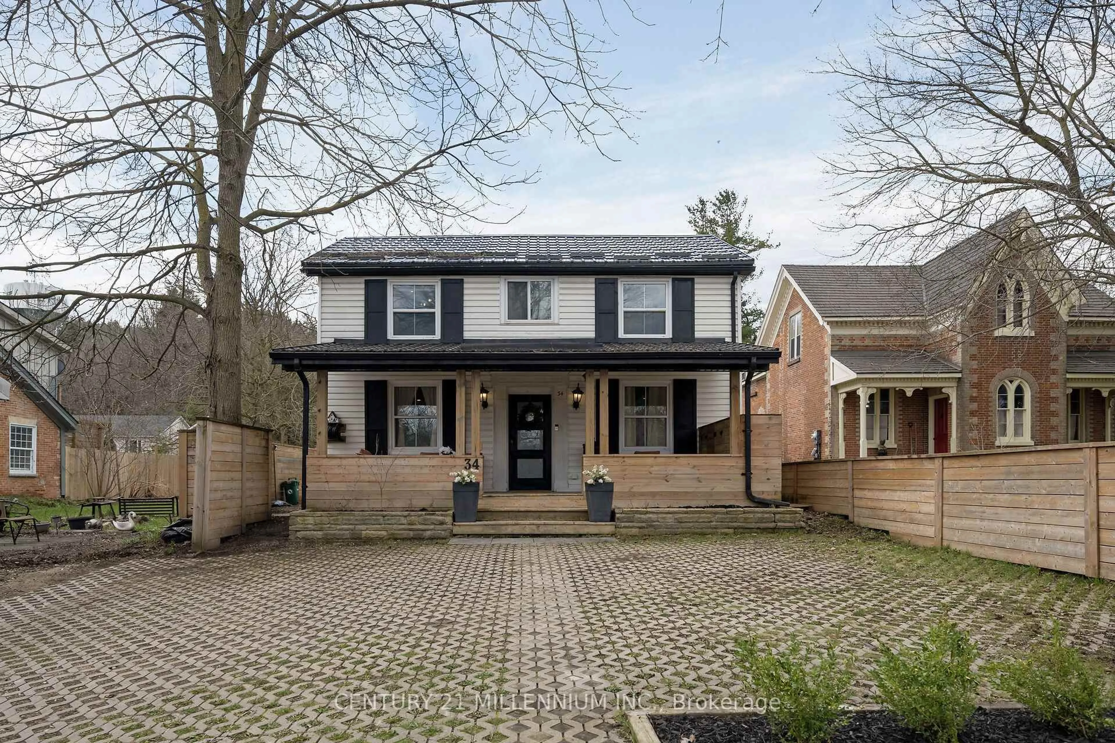 Home with brick exterior material, street for 34 Main St, Erin Ontario N0B 1T0