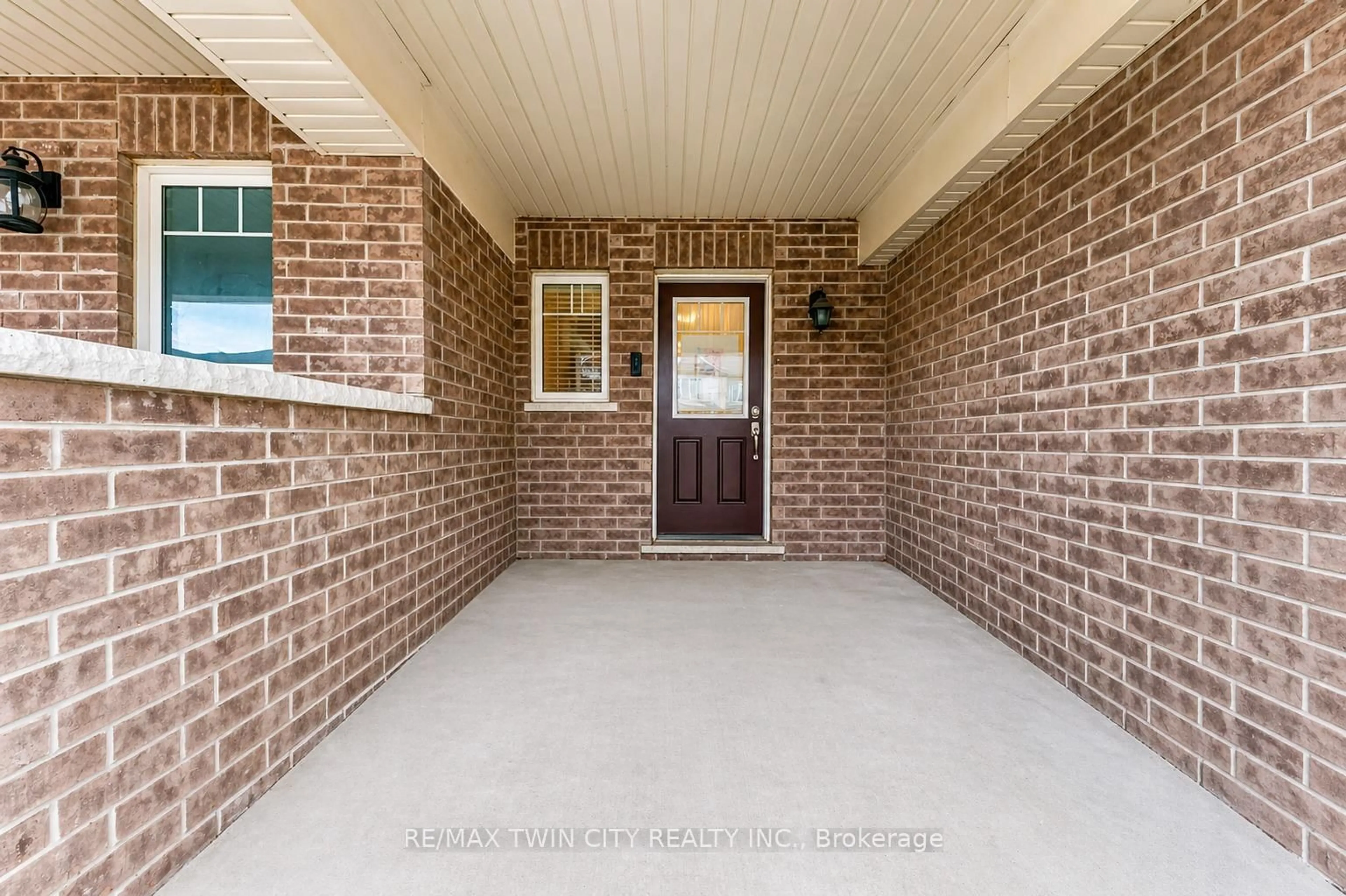 Home with brick exterior material, street for 71 Glenvista Dr, Kitchener Ontario N2R 0E3