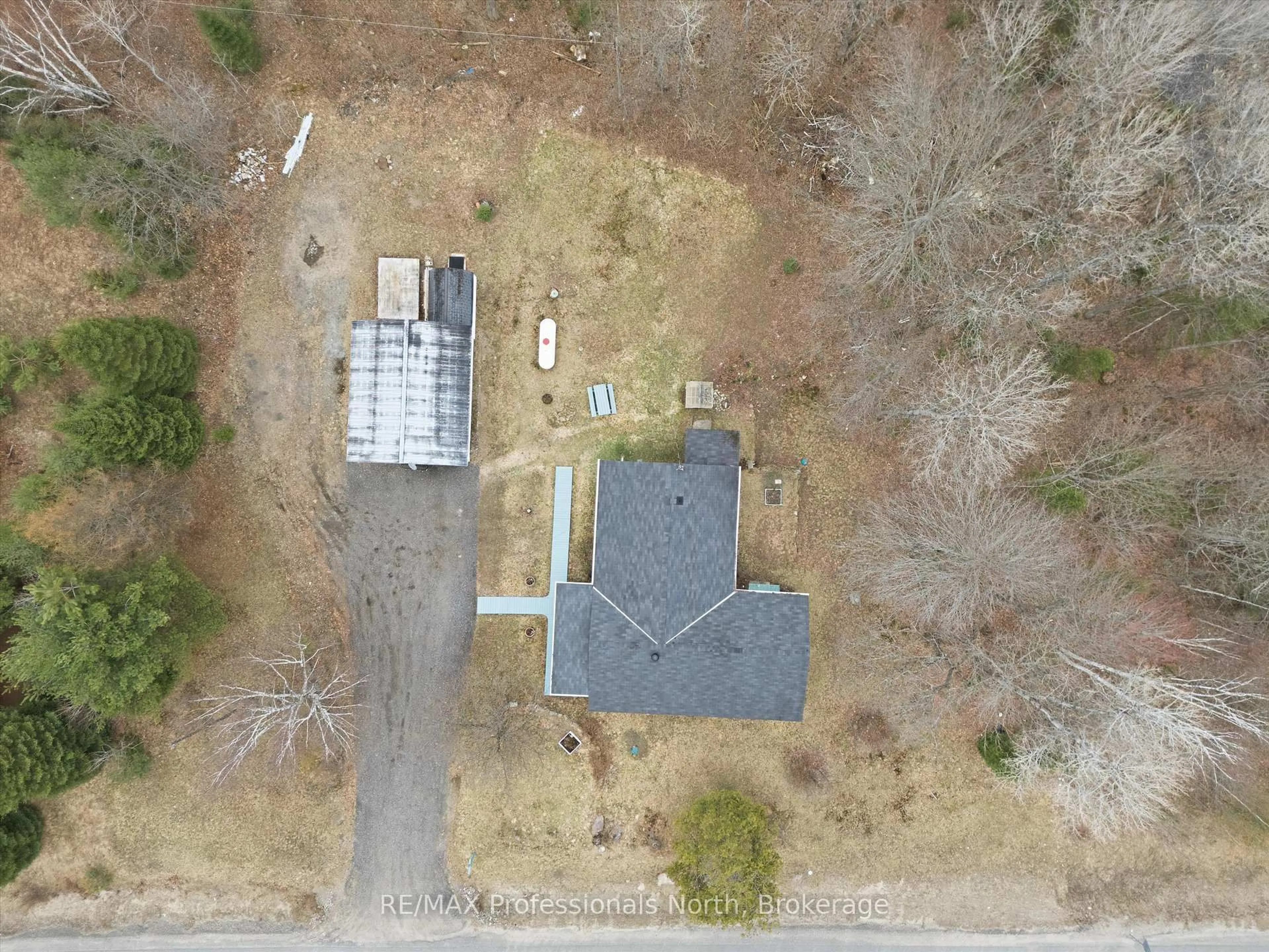 A pic from outside/outdoor area/front of a property/back of a property/a pic from drone, street for 1671 60 Highway, Huntsville Ontario P1H 1A2