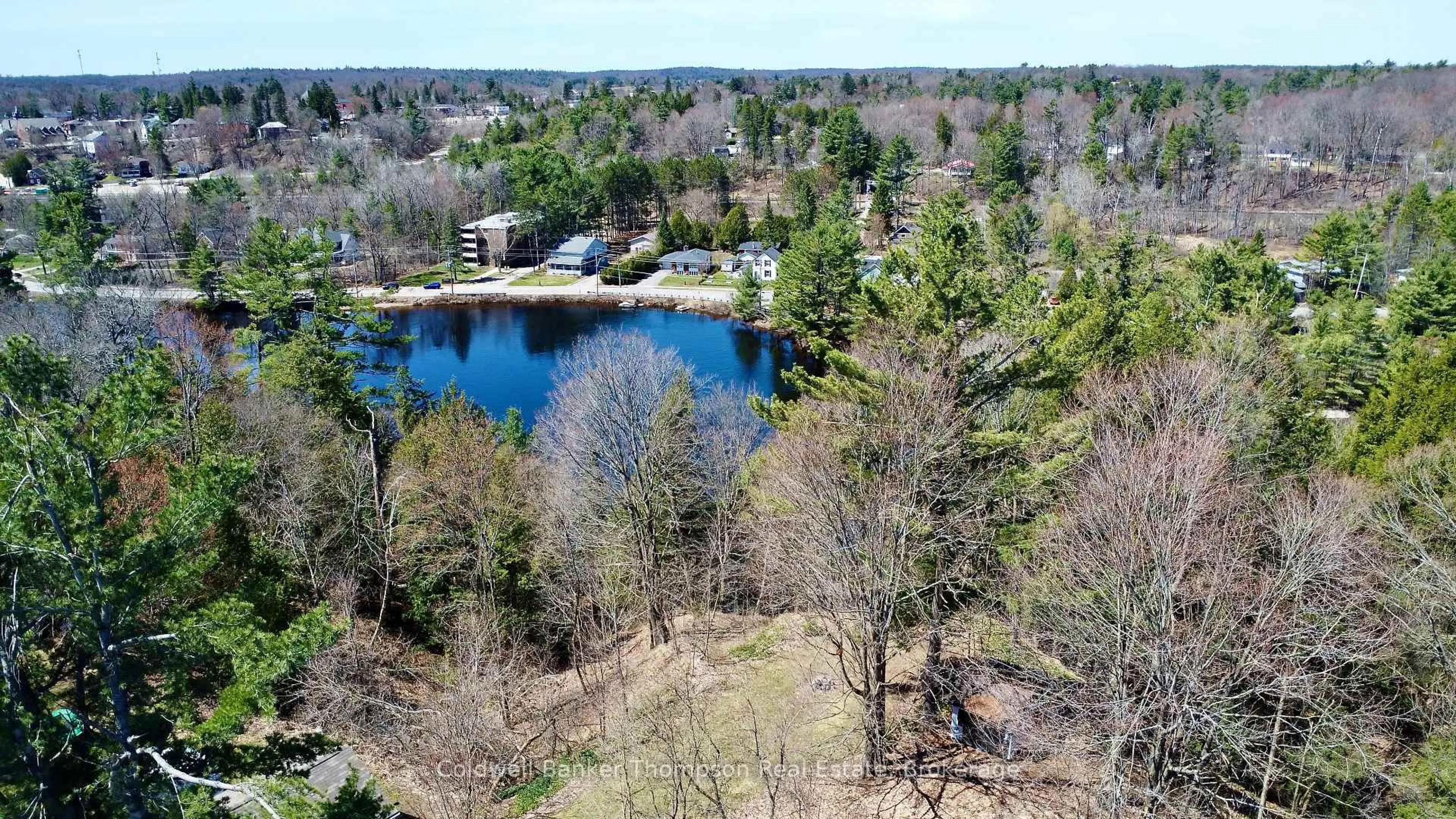 A pic from outside/outdoor area/front of a property/back of a property/a pic from drone, water/lake/river/ocean view for 145 Front St, Bracebridge Ontario P1L 1J7