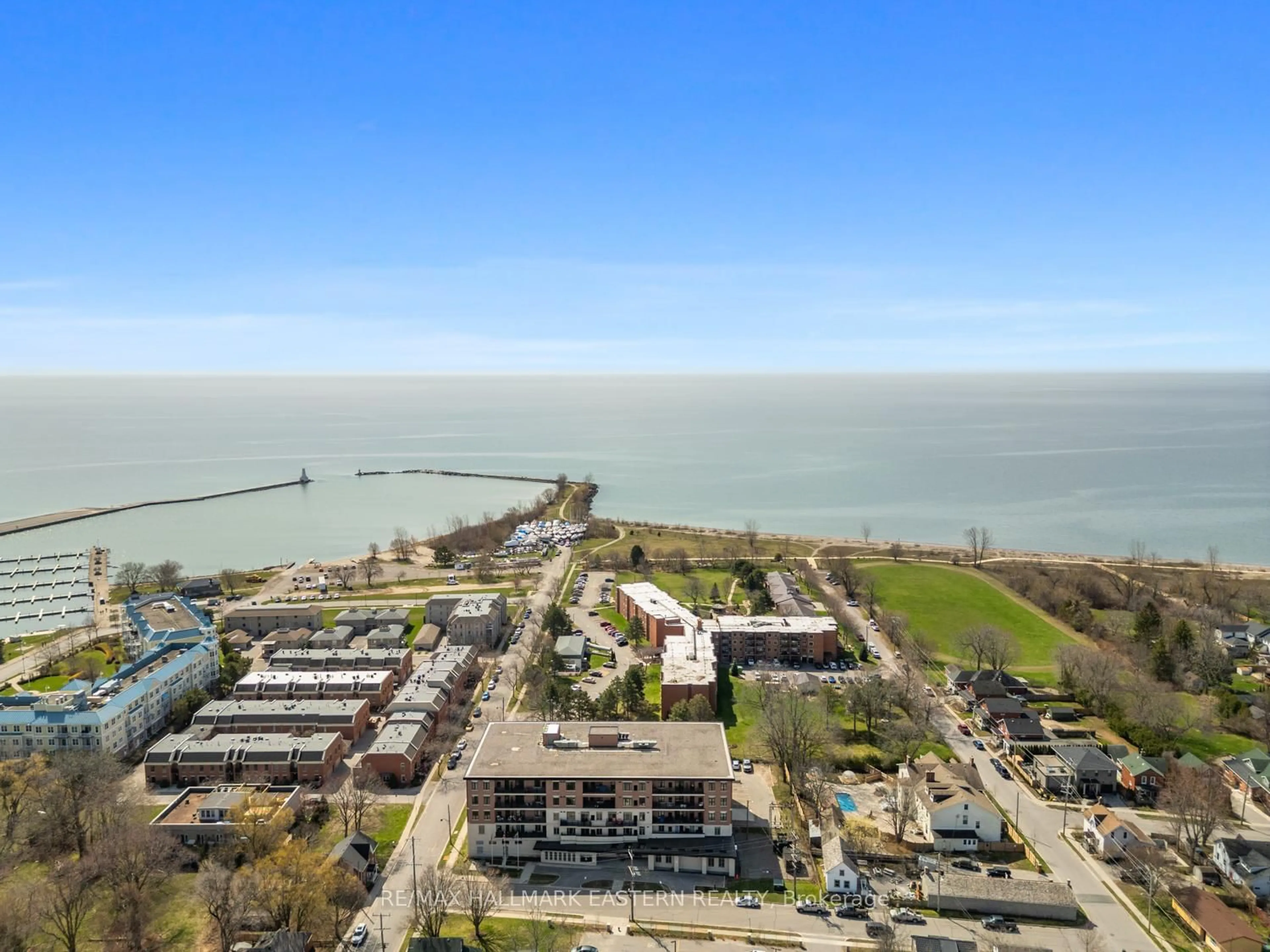 A pic from outside/outdoor area/front of a property/back of a property/a pic from drone, water/lake/river/ocean view for 135 Orr St ##407, Cobourg Ontario K9A 0J6