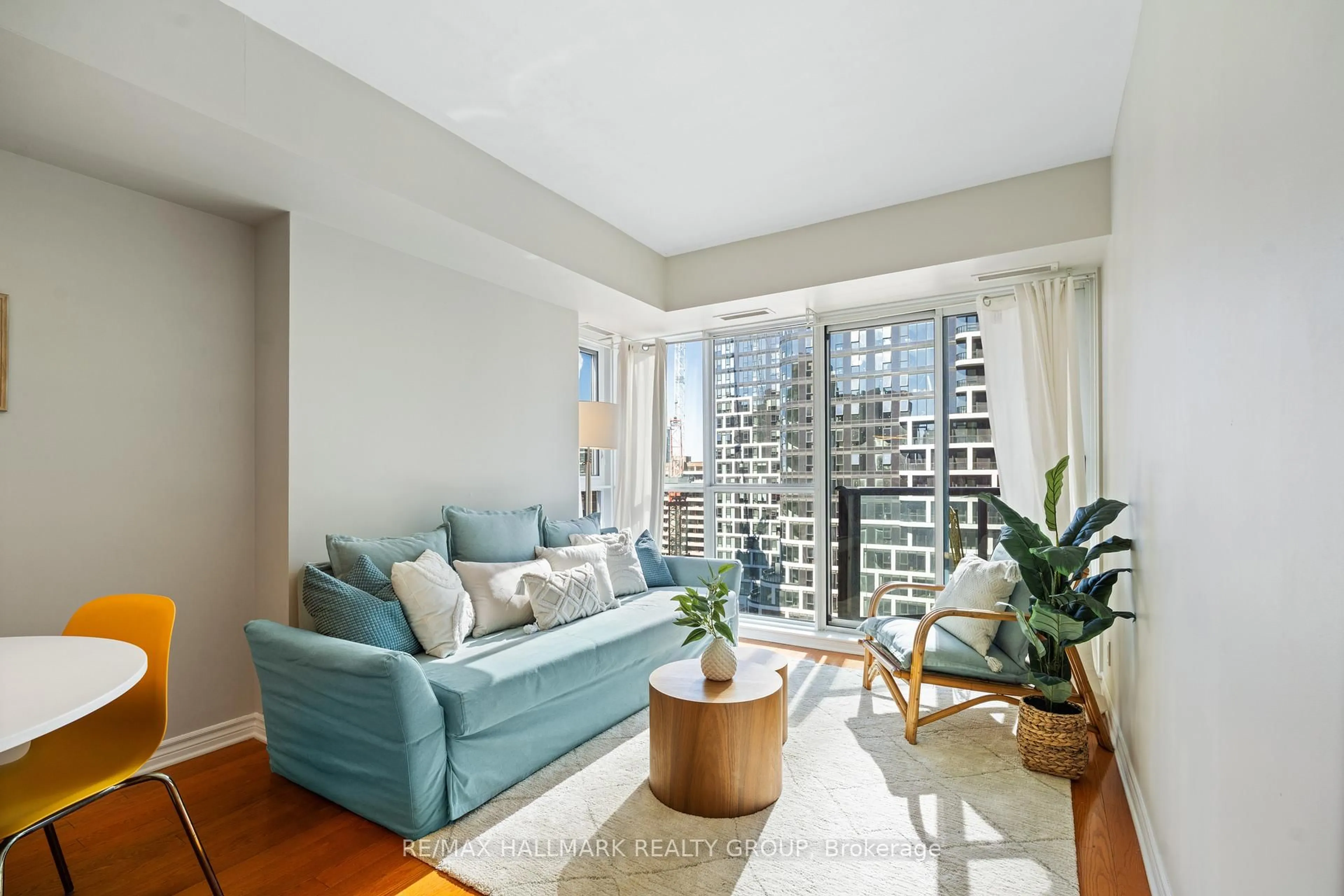 Living room with furniture, unknown for 445 Laurier Ave #2103, Ottawa Ontario K1R 0A2