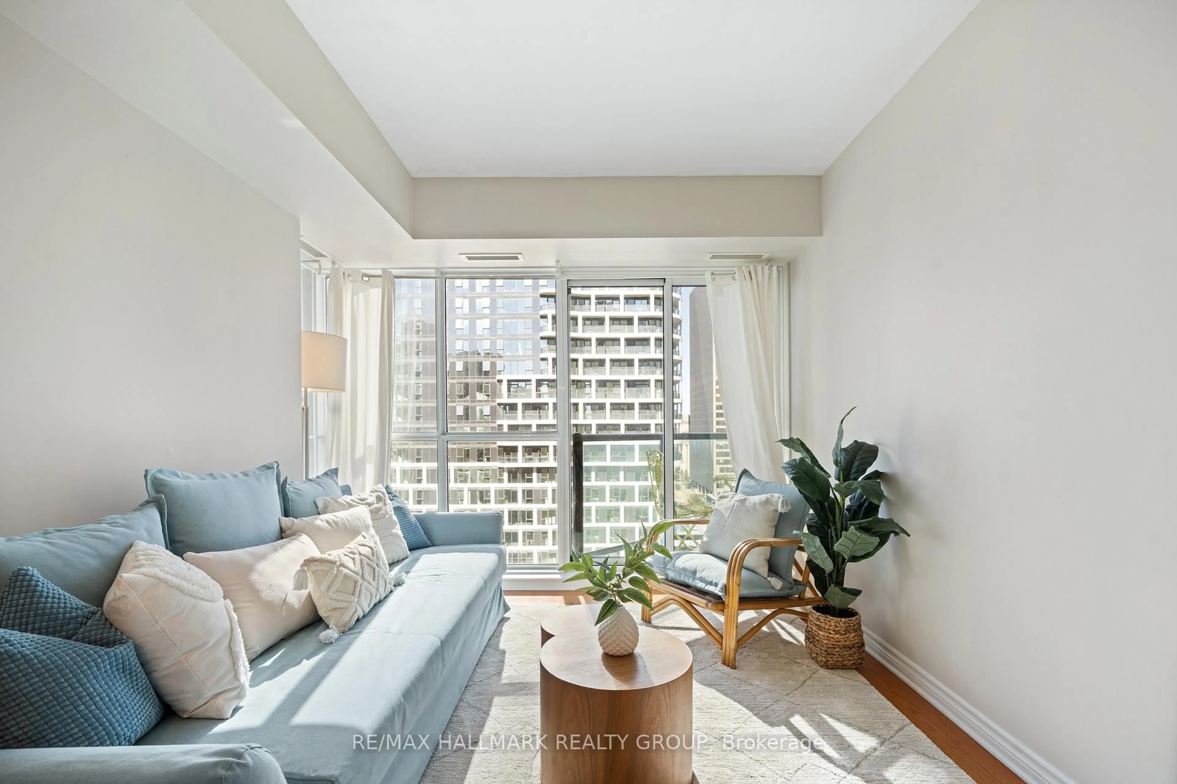 Living room with furniture, unknown for 445 Laurier Ave #2103, Ottawa Ontario K1R 0A2
