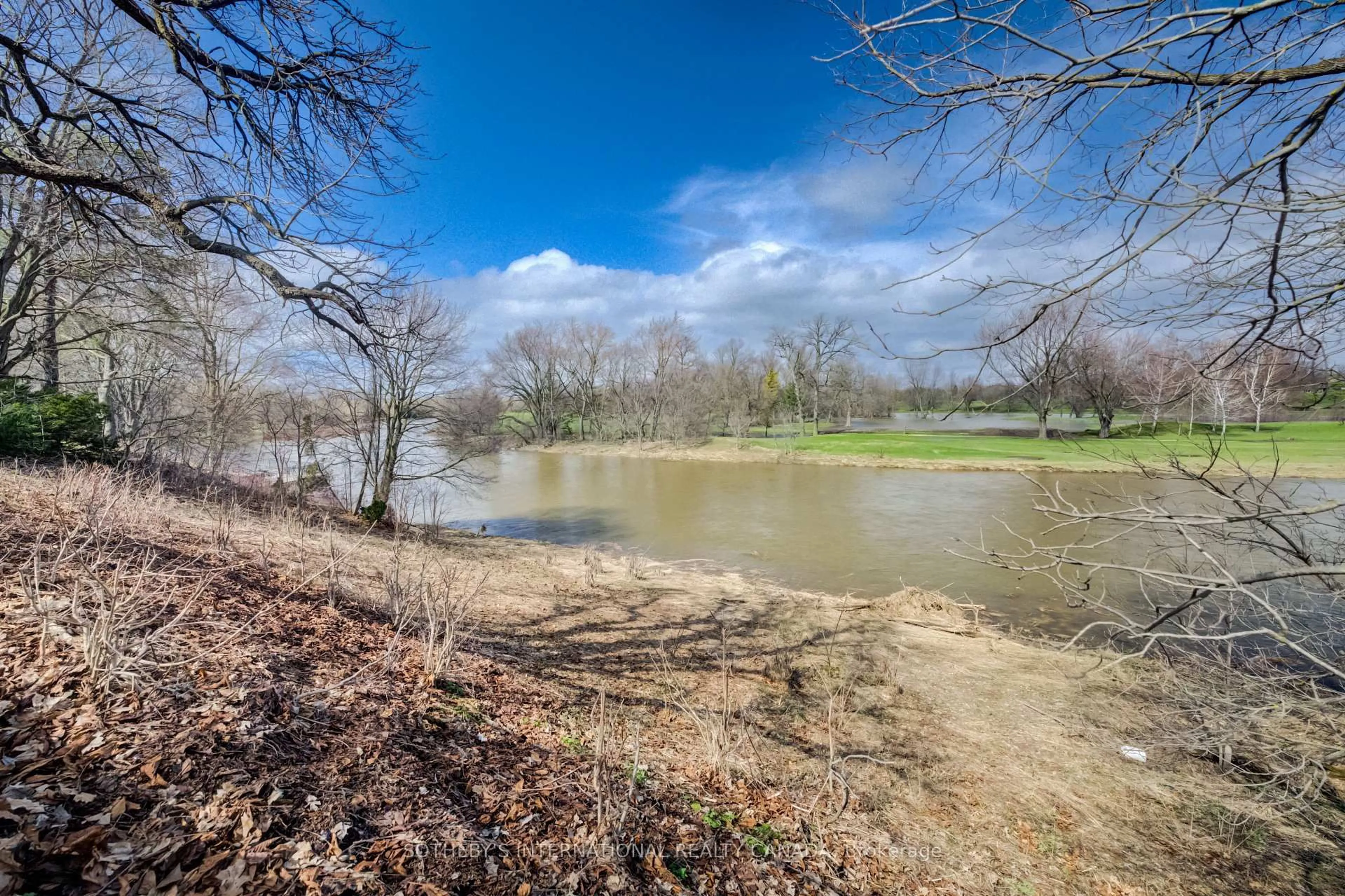 A pic from outside/outdoor area/front of a property/back of a property/a pic from drone, water/lake/river/ocean view for 48 Misty River Dr, Woolwich Ontario N0B 1N0