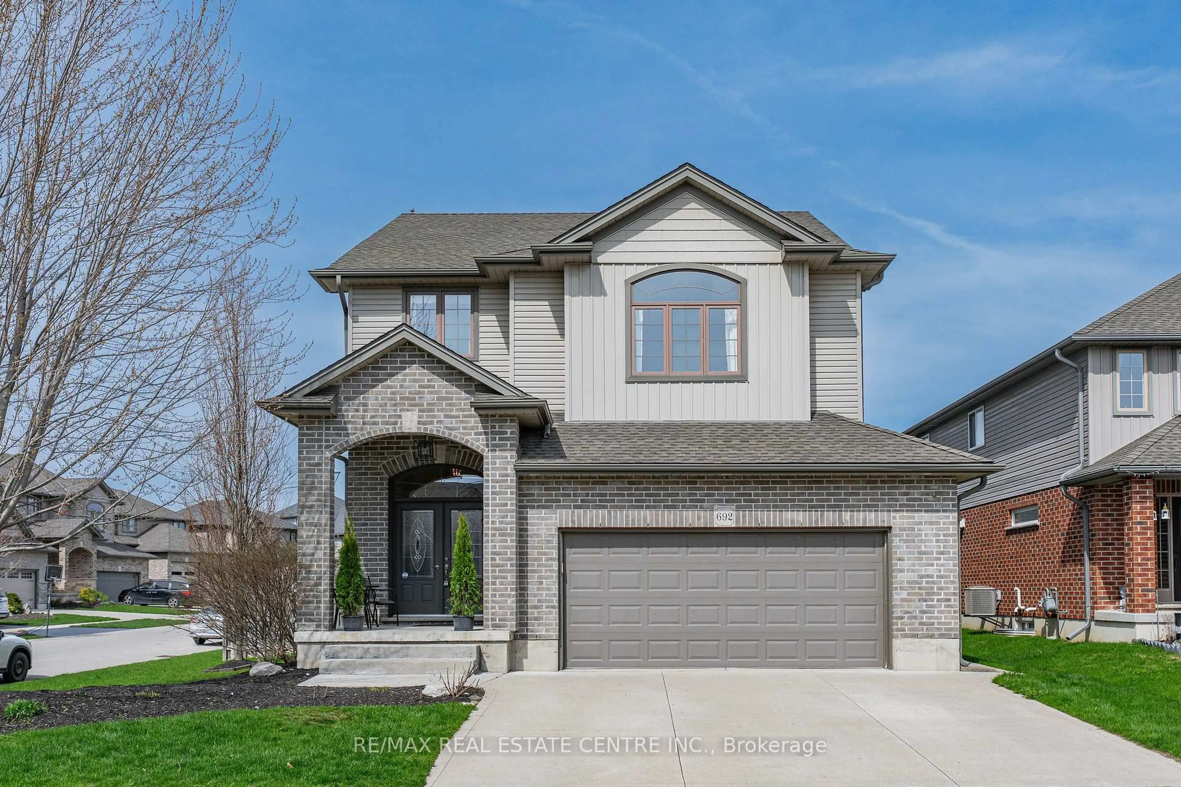 Home with brick exterior material, street for 692 Halifax Rd, Woodstock Ontario N4T 0G1