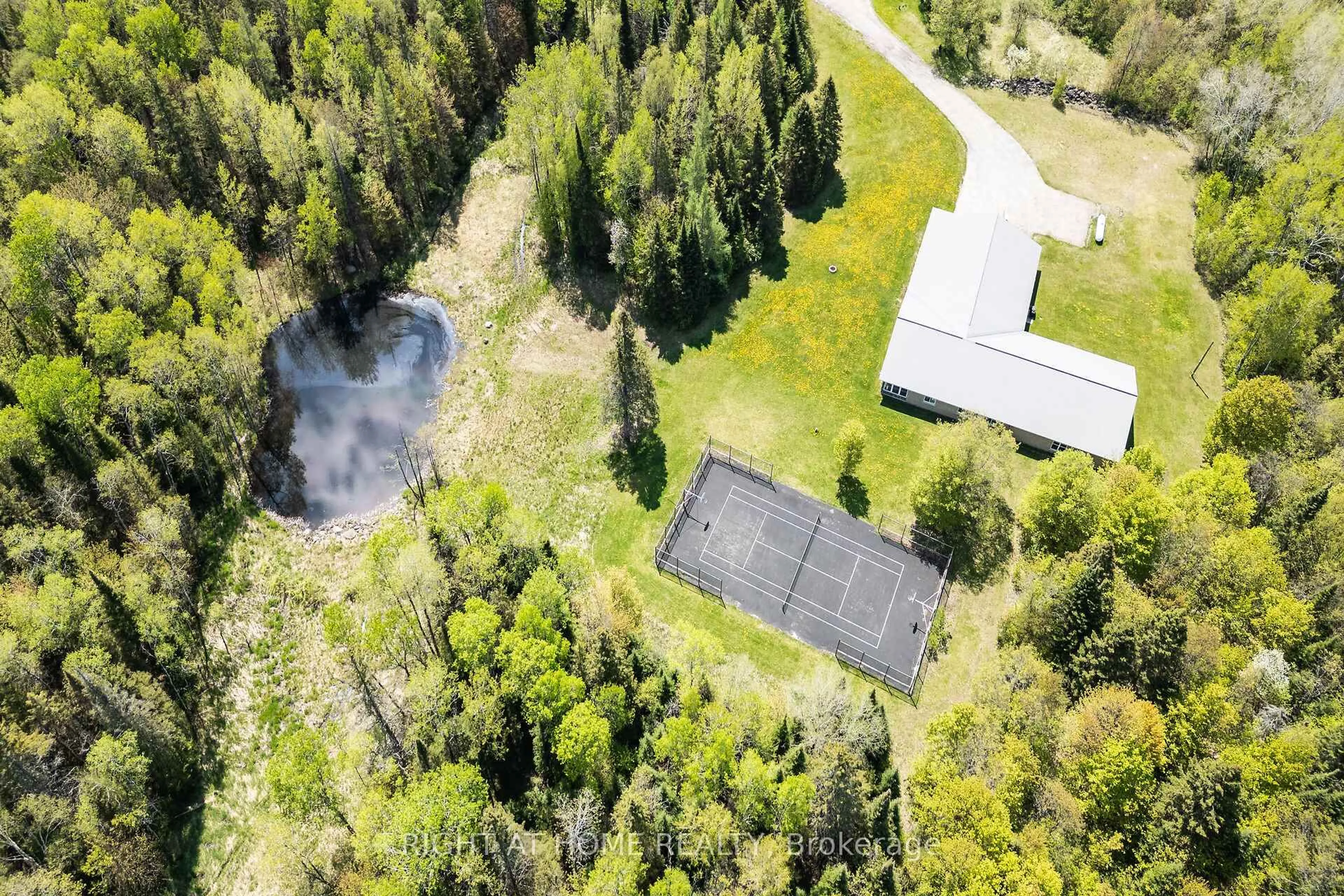 A pic from outside/outdoor area/front of a property/back of a property/a pic from drone, forest/trees view for 146 Oke Dr, Armour Ontario P0A 1C0