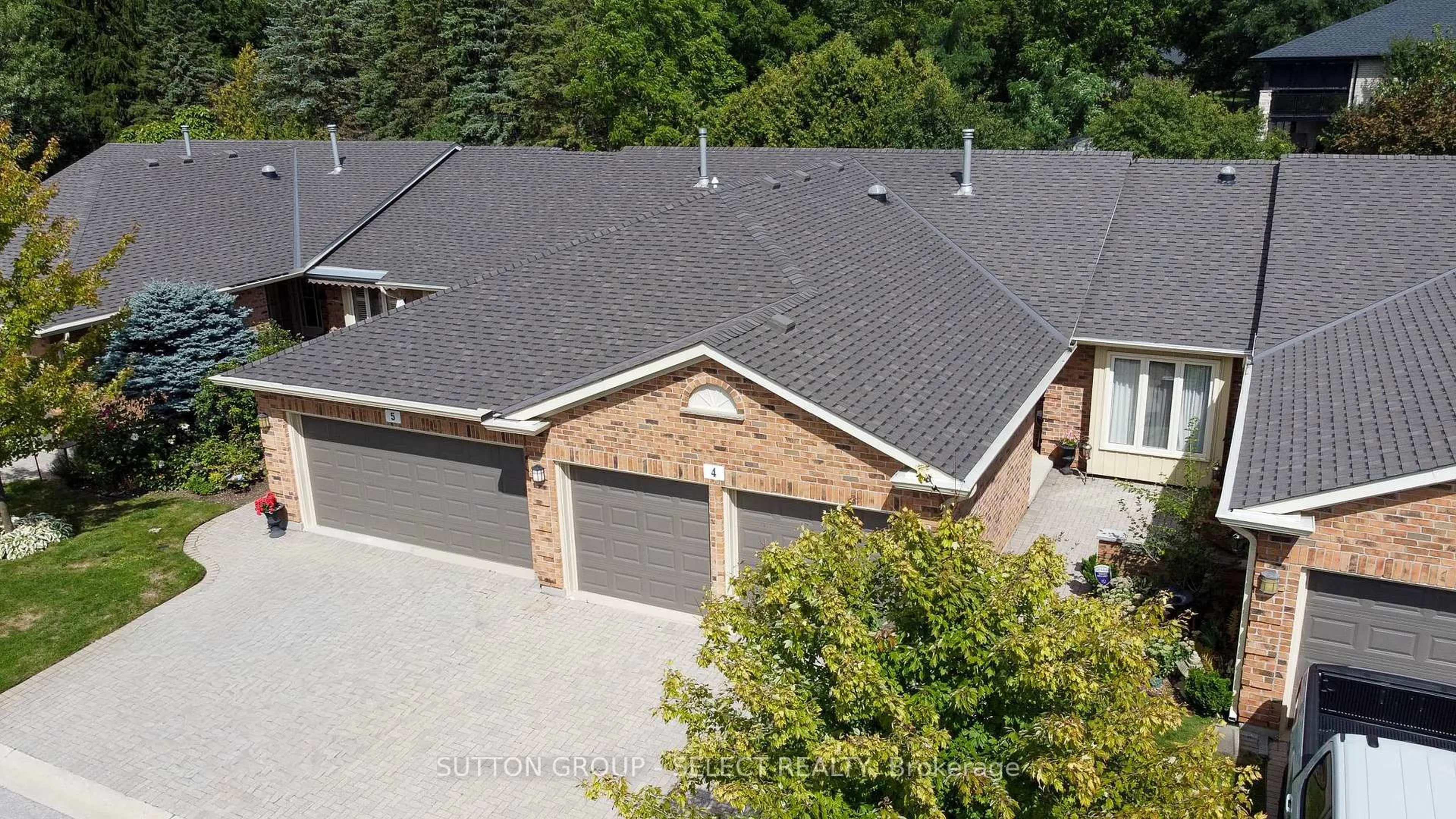 A pic from outside/outdoor area/front of a property/back of a property/a pic from drone, unknown for 445 Riverside Dr #4, London North Ontario N6H 2R8