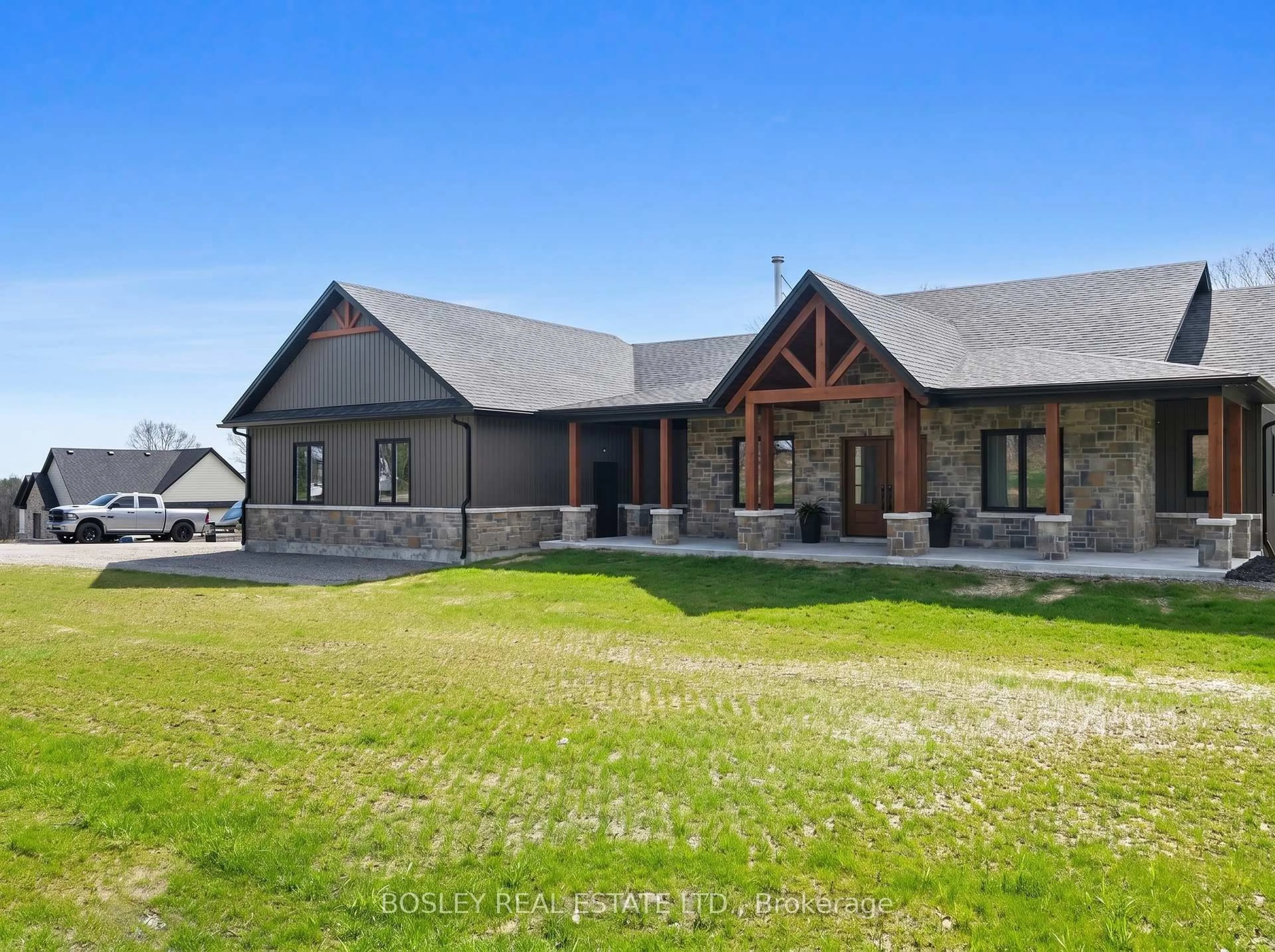 A pic from outside/outdoor area/front of a property/back of a property/a pic from drone, mountain view for 3922 Kennedy Rd, Hamilton Township Ontario K9A 4J7
