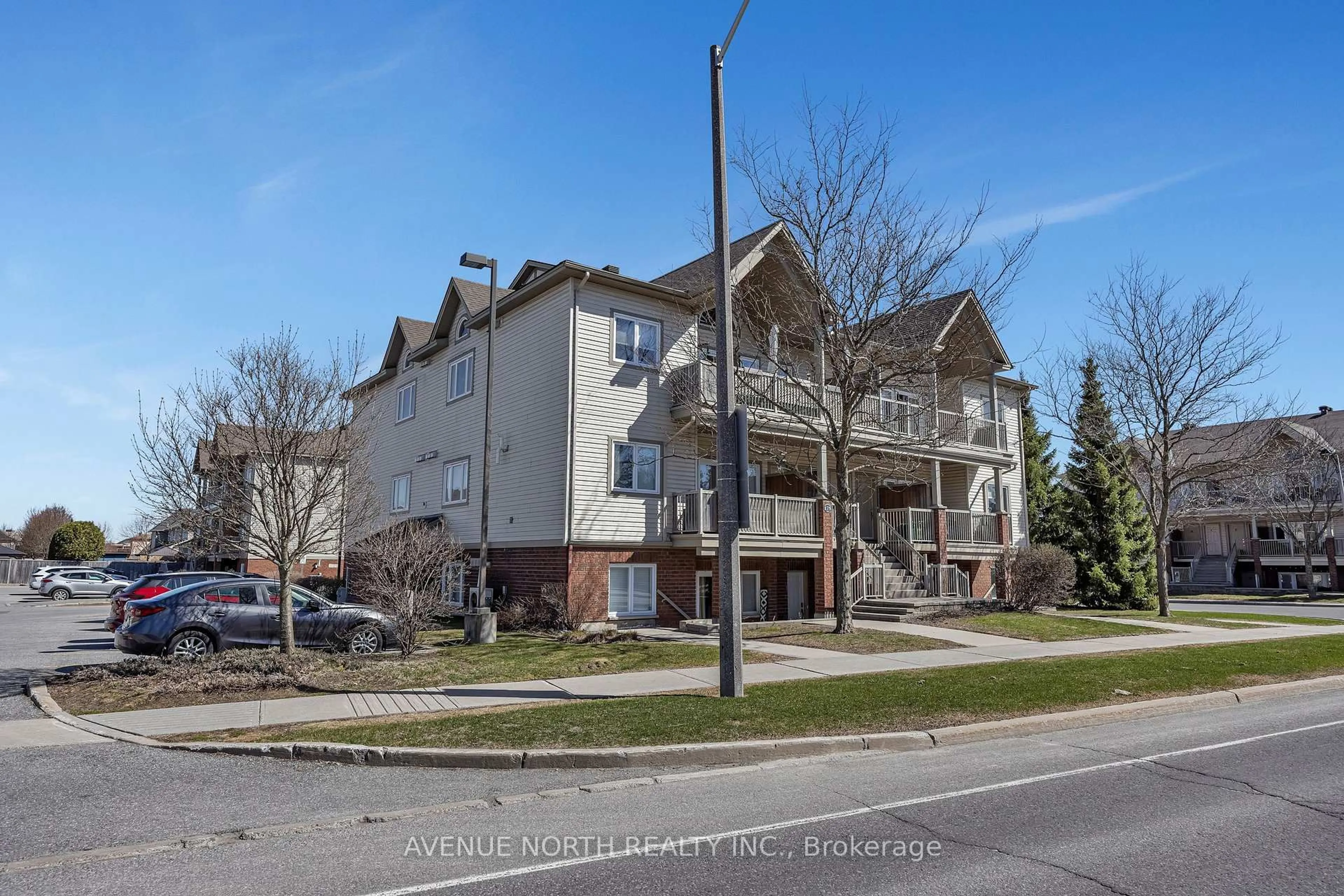 A pic from outside/outdoor area/front of a property/back of a property/a pic from drone, street for 175 Waterbridge Dr #4, Ottawa Ontario K2G 7G3