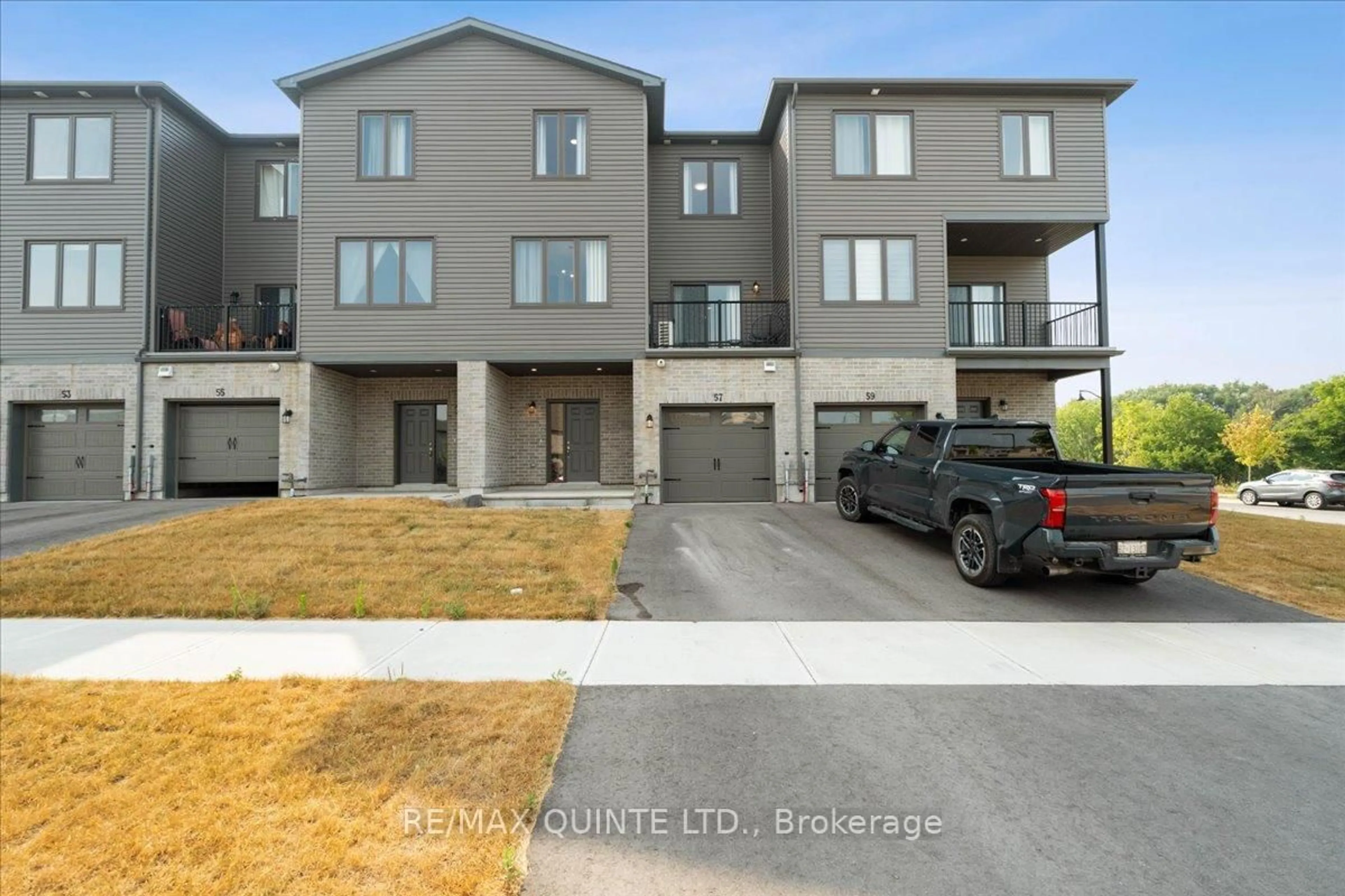 A pic from outside/outdoor area/front of a property/back of a property/a pic from drone, mountain view for 57 Markland Ave, Prince Edward County Ontario K0K 2T0