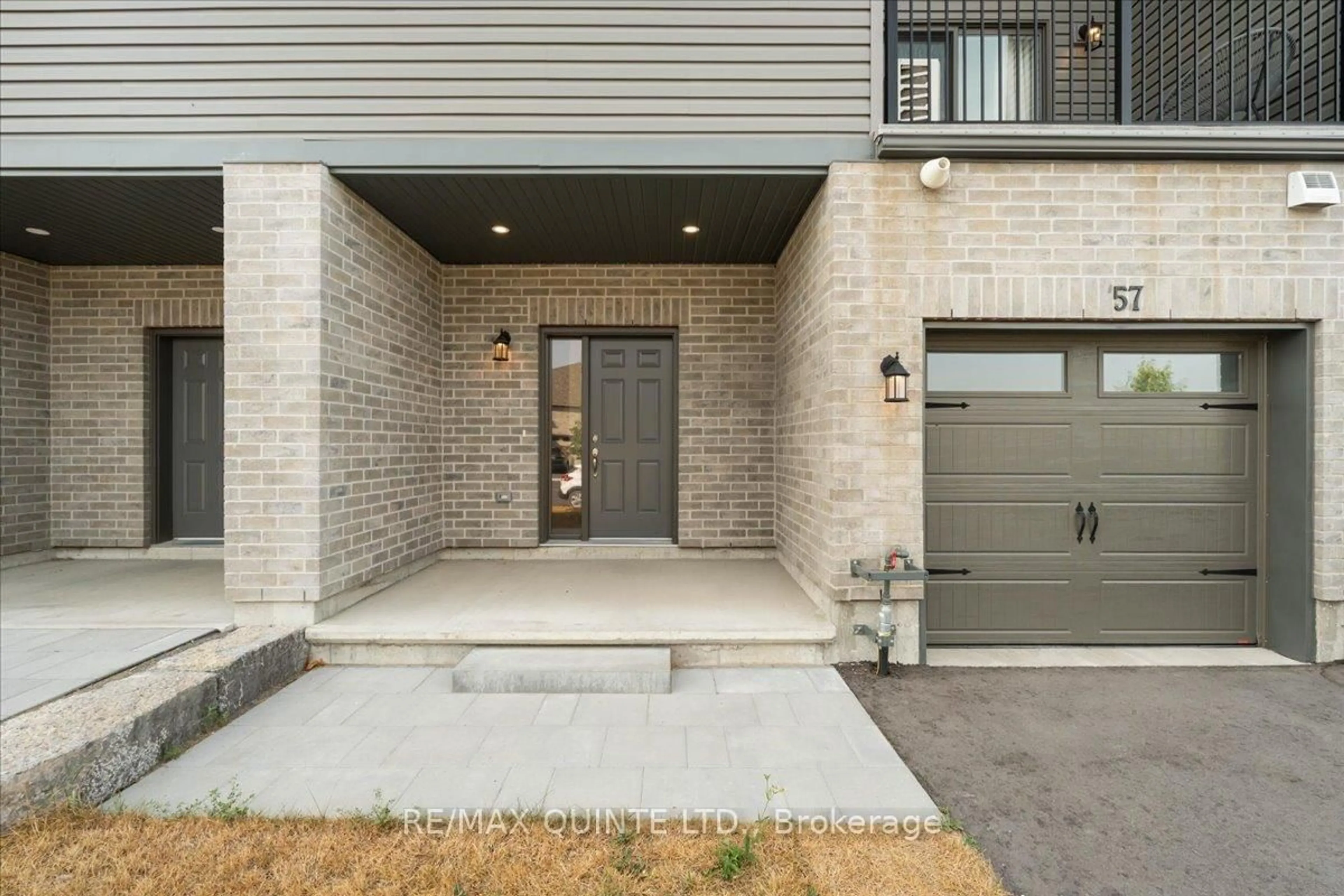 Home with brick exterior material, street for 57 Markland Ave, Prince Edward County Ontario K0K 2T0